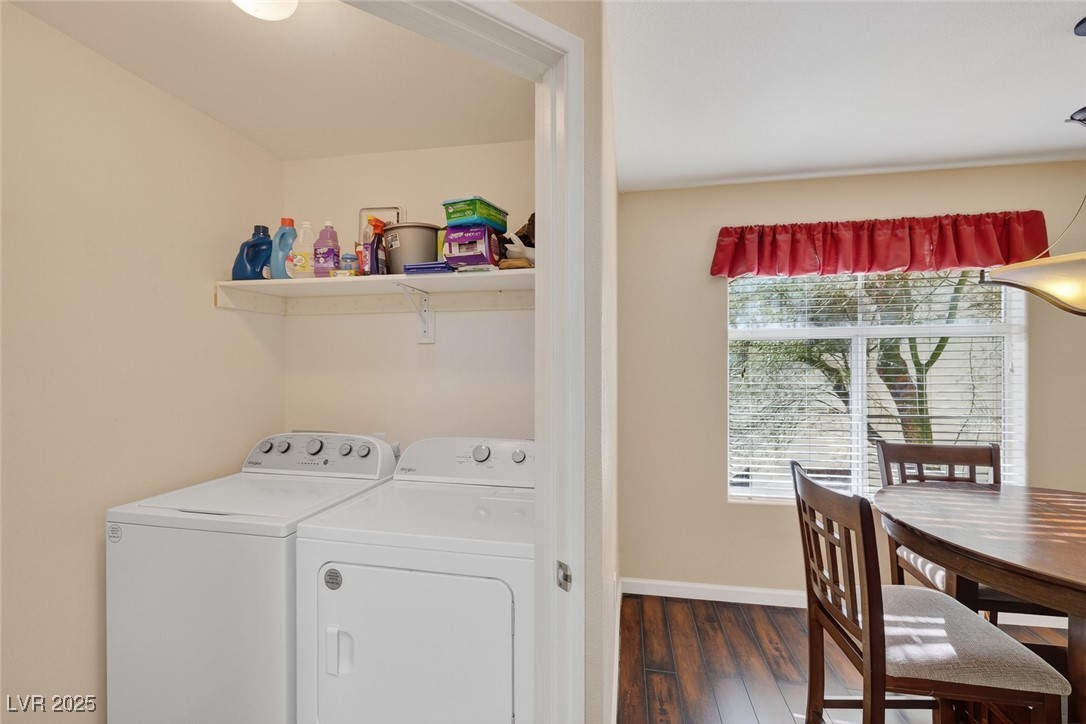 698 South Racetrack Road, Unit 1222 Henderson, NV 89015 - Photo 24 of 31 Washroom with dark wood-style flooring and washer and dryer