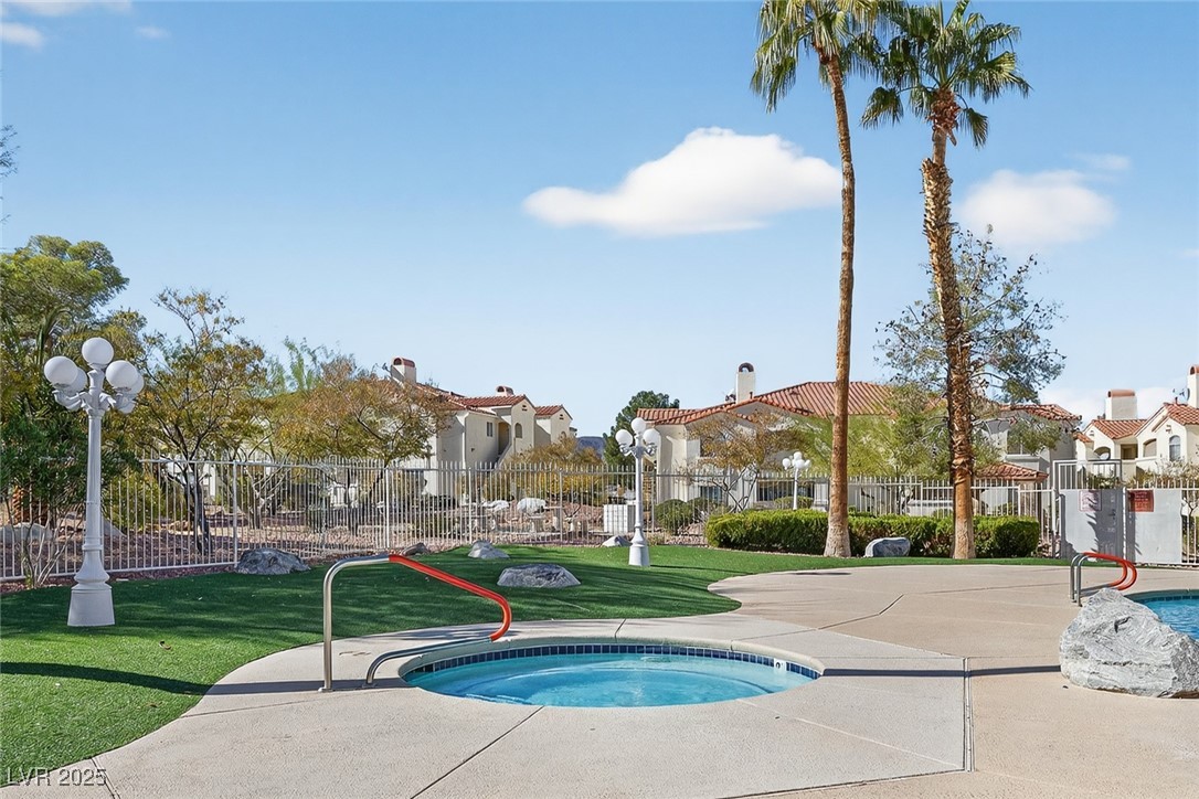 698 South Racetrack Road, Unit 1222 Henderson, NV 89015 - Photo 29 of 31 View of pool with a hot tub, a residential view, and a patio