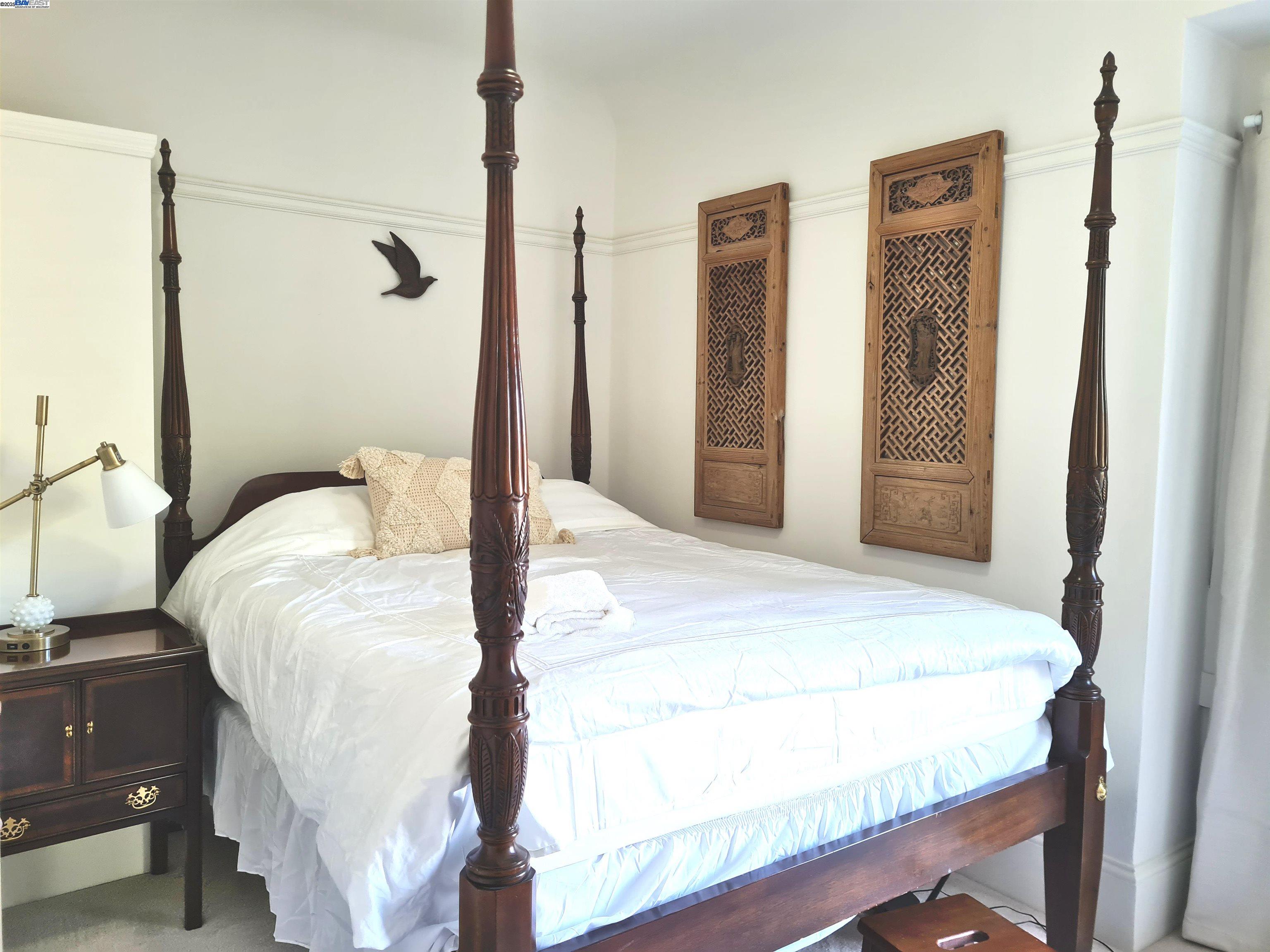 3103 Central Alameda, CA 94501 - Photo 20 of 50 a bedroom with a bed and a mirror