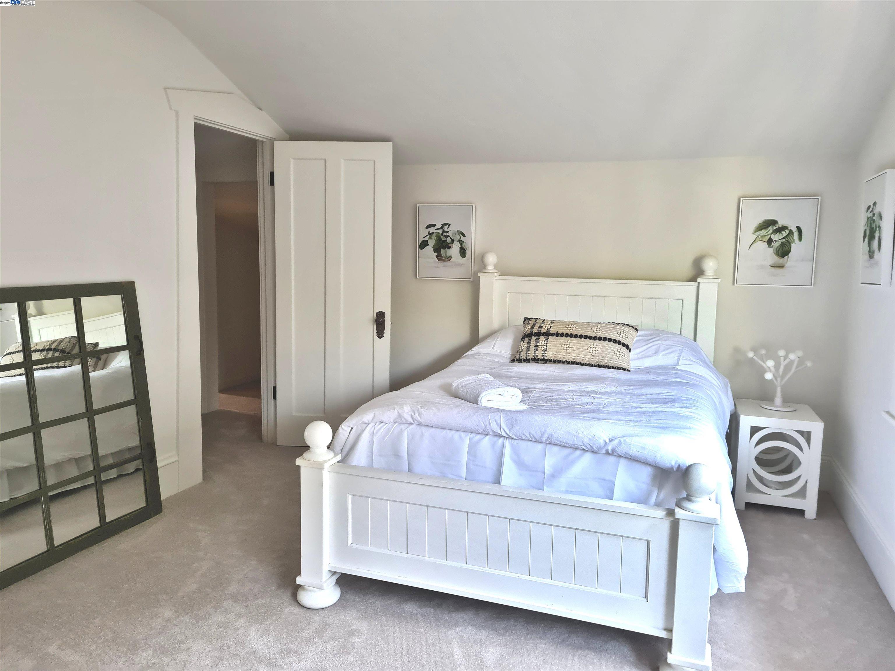 3103 Central Alameda, CA 94501 - Photo 26 of 50 a bedroom with a bed and a window