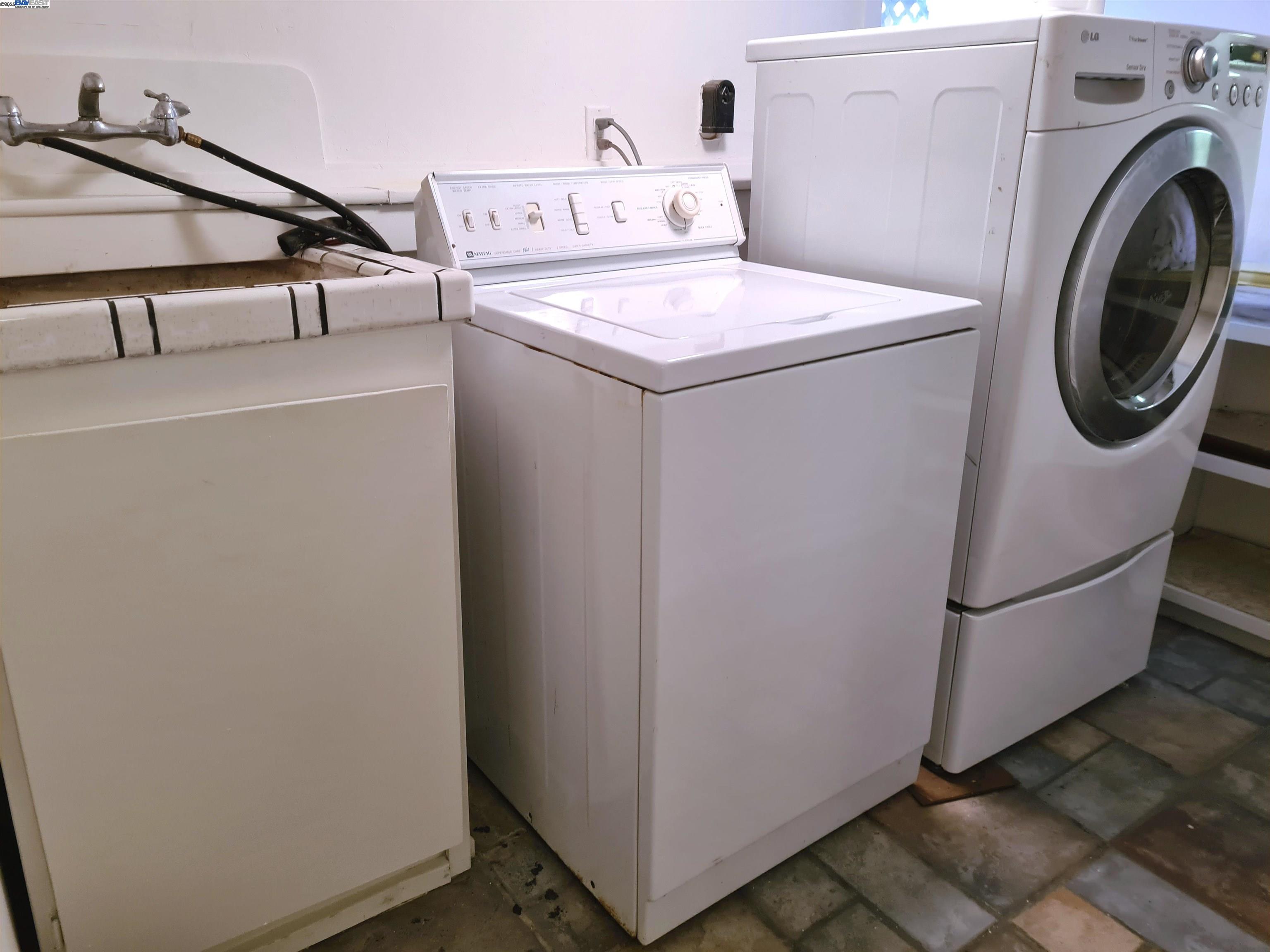 3103 Central Alameda, CA 94501 - Photo 39 of 50 a utility room with dryer and washer