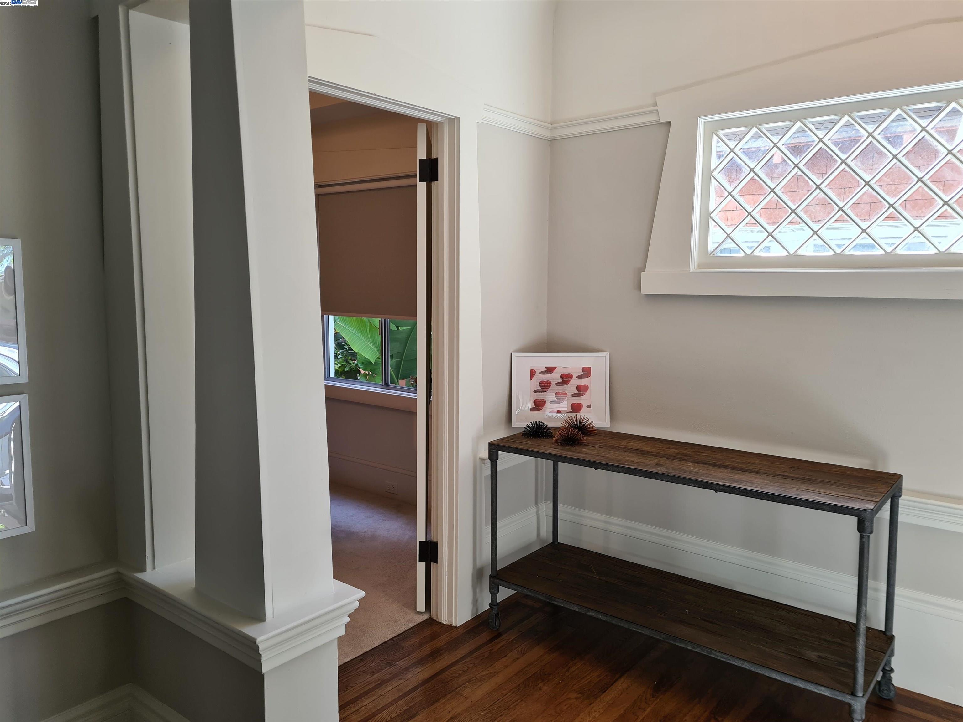 3103 Central Alameda, CA 94501 - Photo 4 of 50 a hallway with table and flowerpot