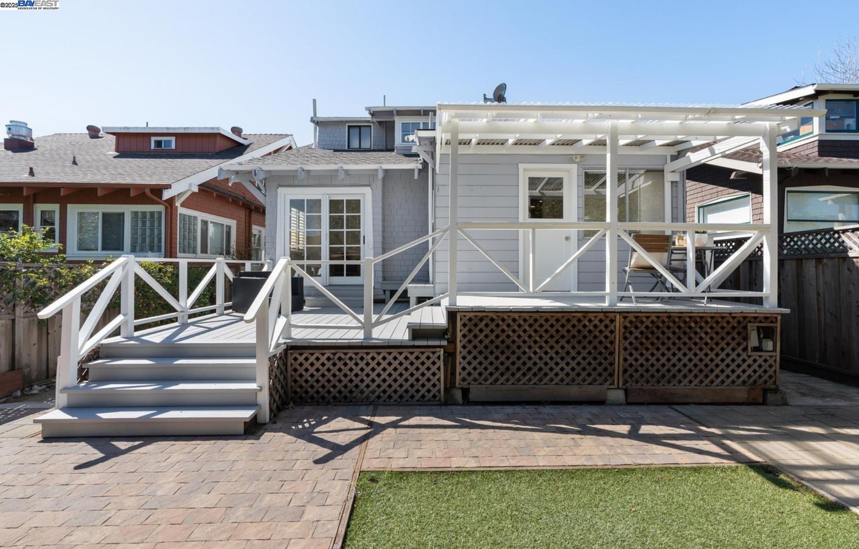 3103 Central Alameda, CA 94501 - Photo 41 of 50 a view of a house with backyard porch and wooden fence