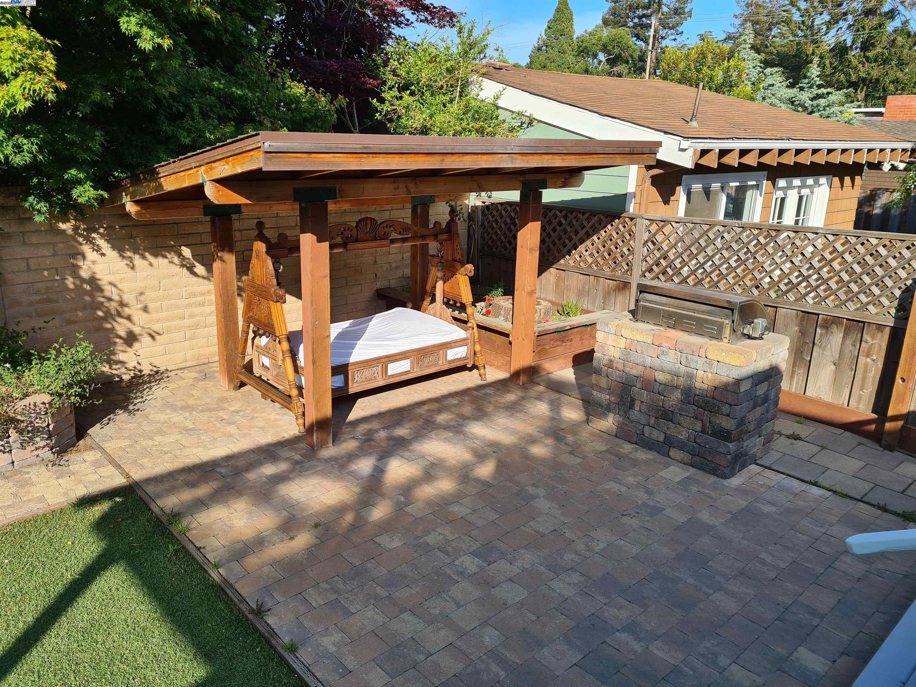 3103 Central Alameda, CA 94501 - Photo 45 of 50 a view of patio with a table and chairs under an umbrella