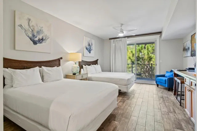 a bed room with a bed and a television