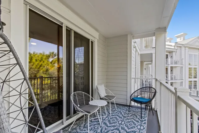 a balcony with chairs