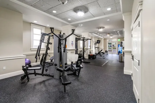 a view of a swimming pool with sitting area