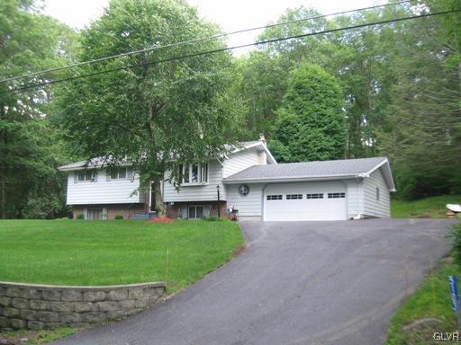 5103 High Terrace Road Stroudsburg, PA 18360 - Photo 2 of 20 a house view with a garden space