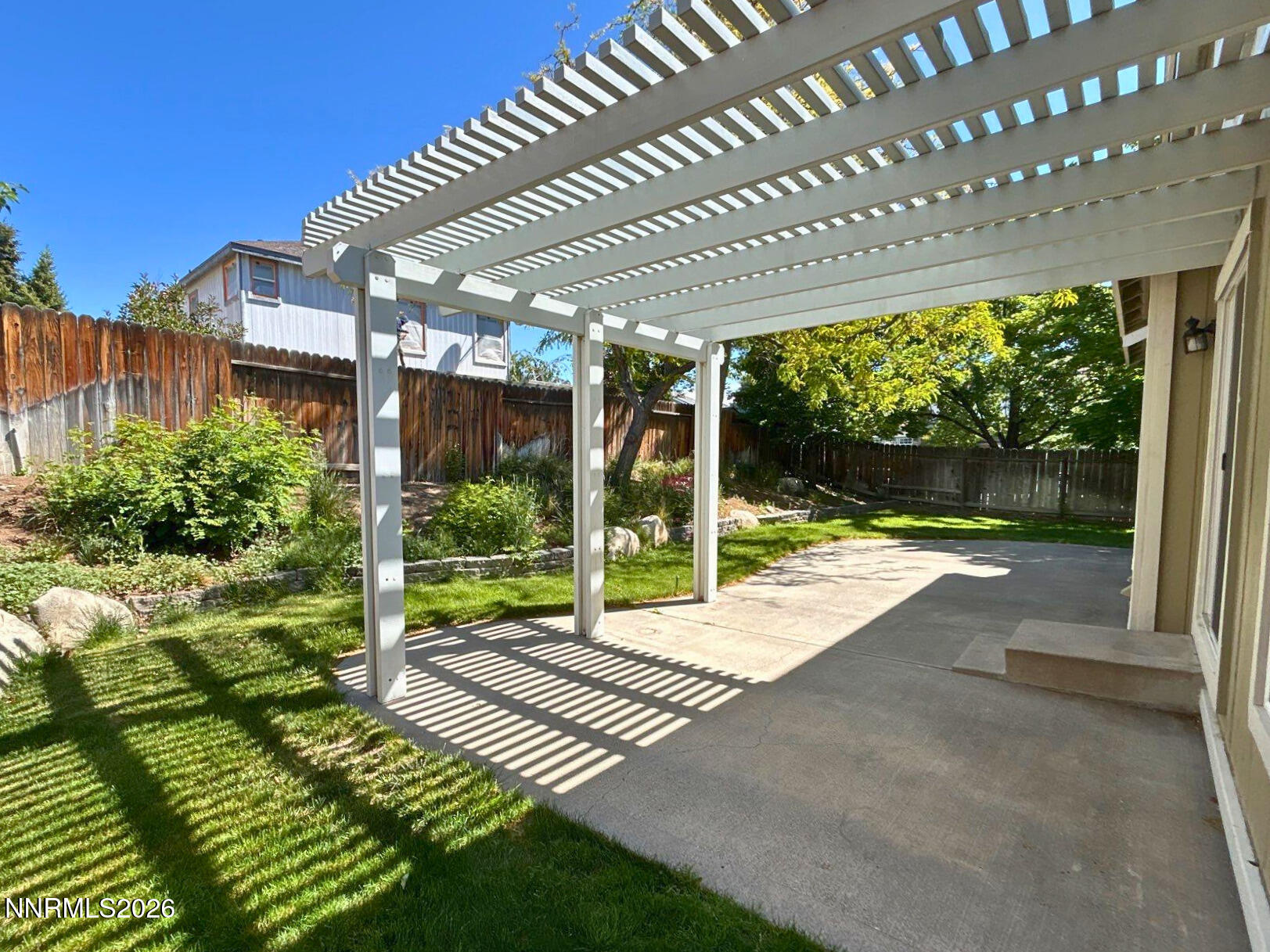 4437 Highplains Drive Reno, NV 89523 - Photo 18 of 19 a view of backyard with green space