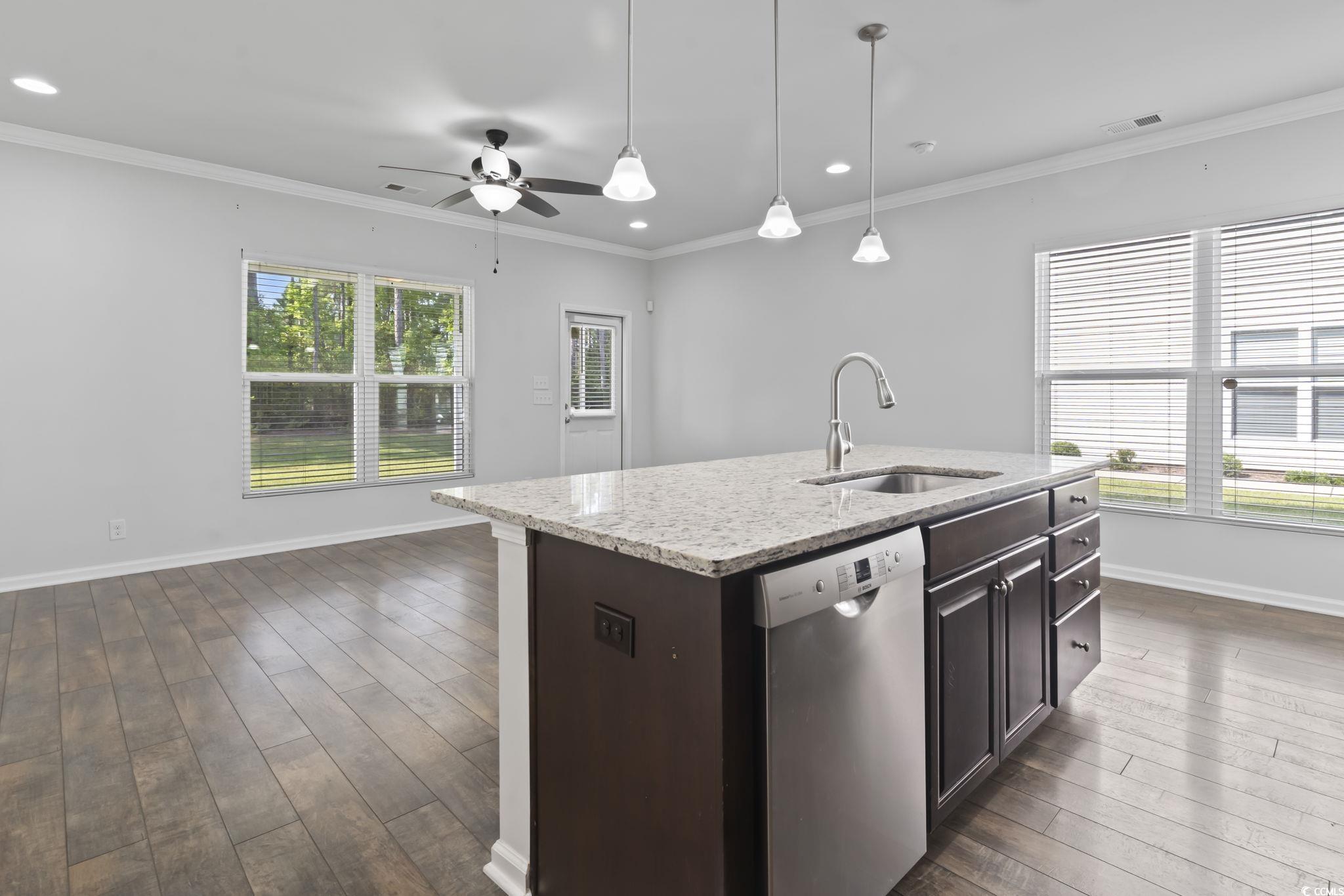 301 Castle Drive, Unit 301 Myrtle Beach, SC 29579 - Photo 14 of 30 Kitchen featuring dark hardwood / wood-style floor