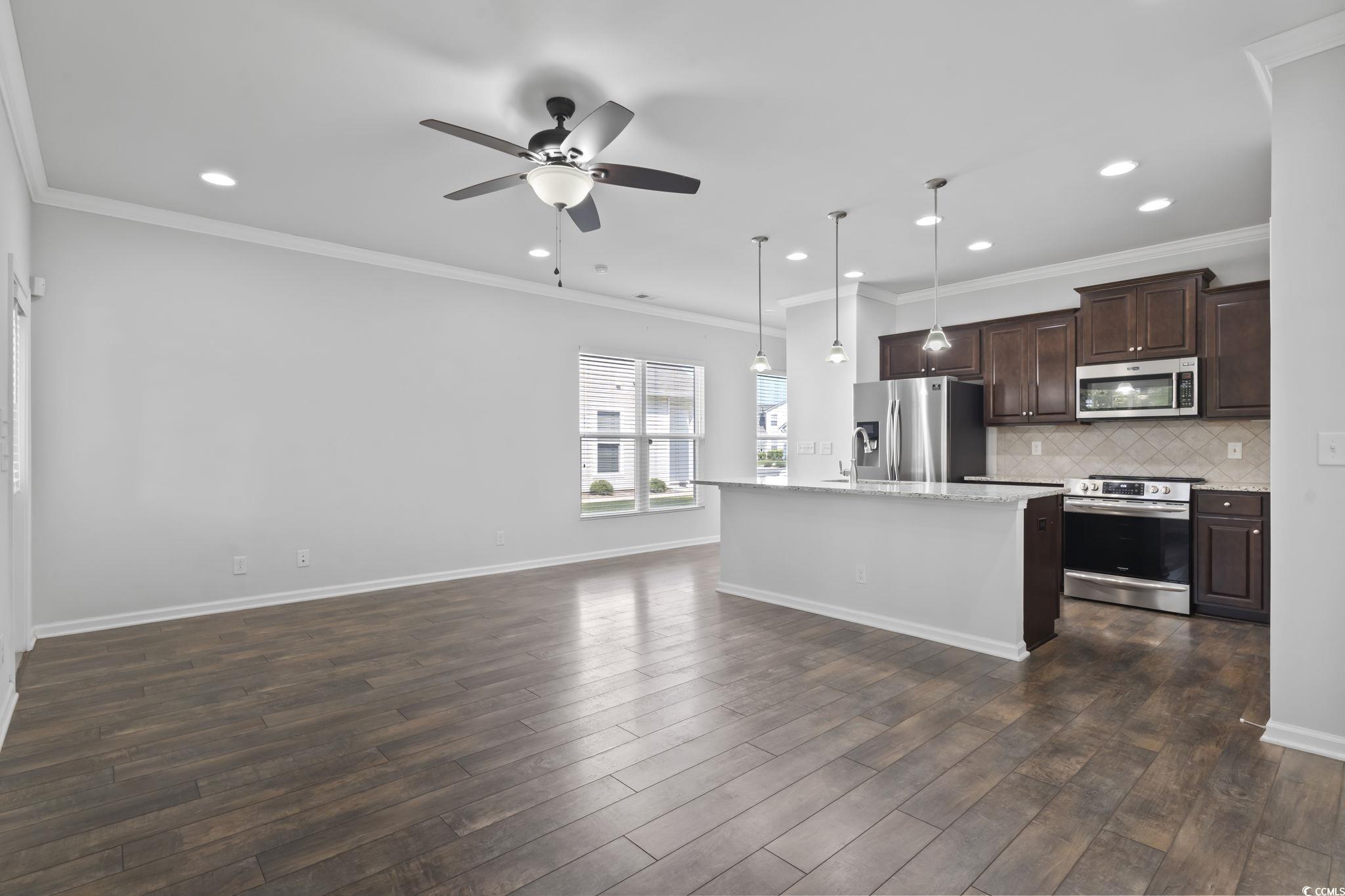 301 Castle Drive, Unit 301 Myrtle Beach, SC 29579 - Photo 18 of 30 Kitchen with appliances with stainless steel finis