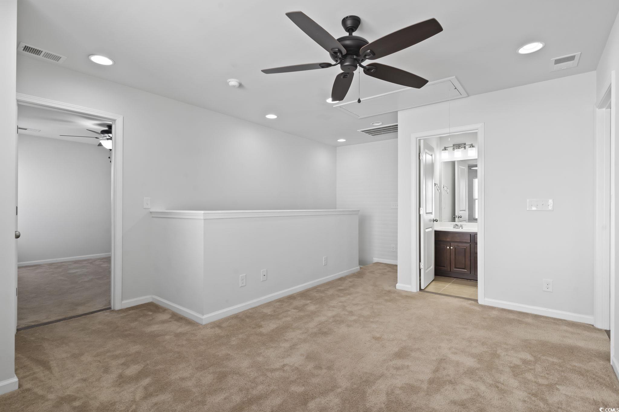 301 Castle Drive, Unit 301 Myrtle Beach, SC 29579 - Photo 19 of 30 Unfurnished bedroom featuring ceiling fan, light c
