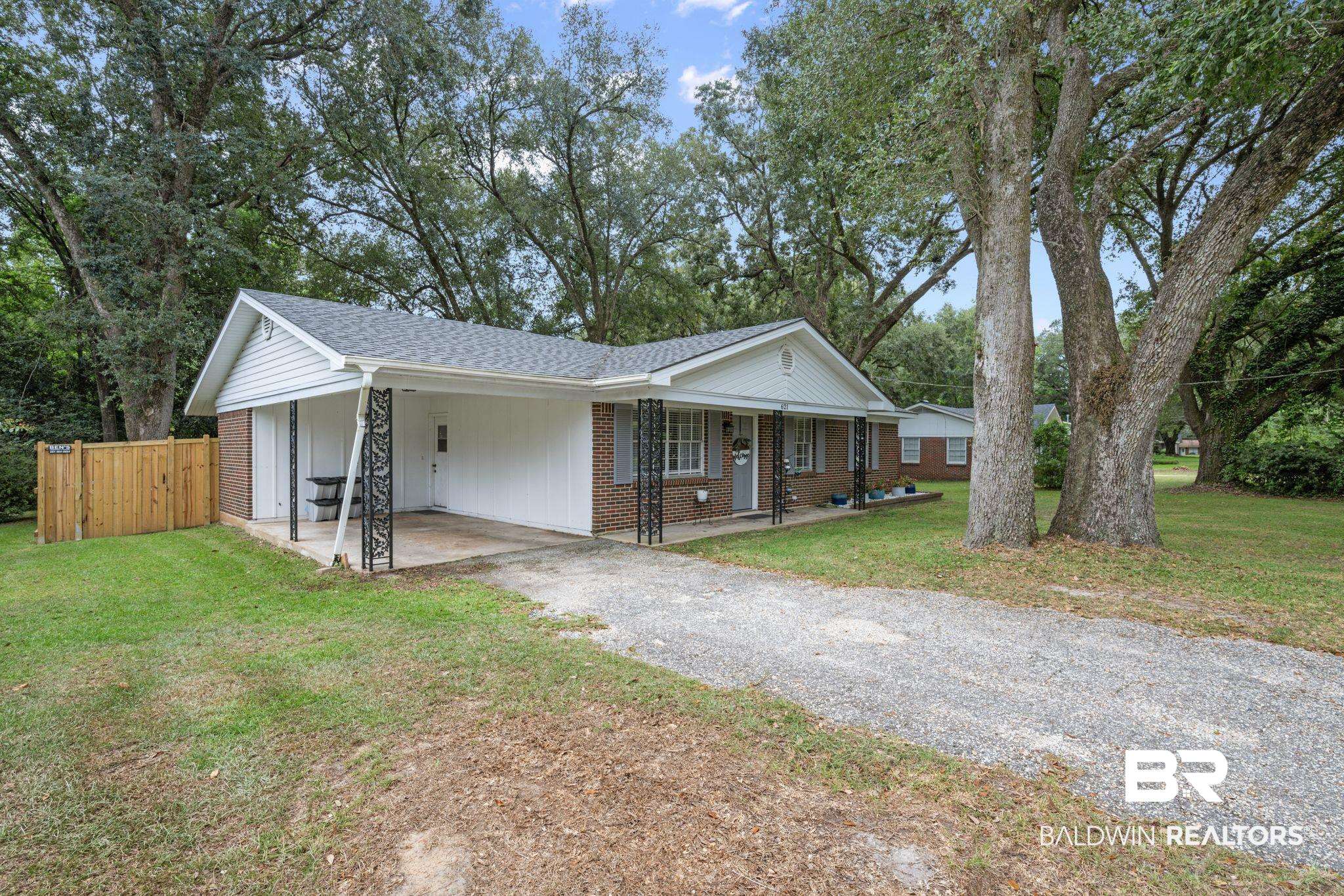 621 Ann Street Saraland, AL 36571 - Photo 21 of 21 Ranch-style house with a front lawn