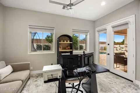 a living room with furniture and window