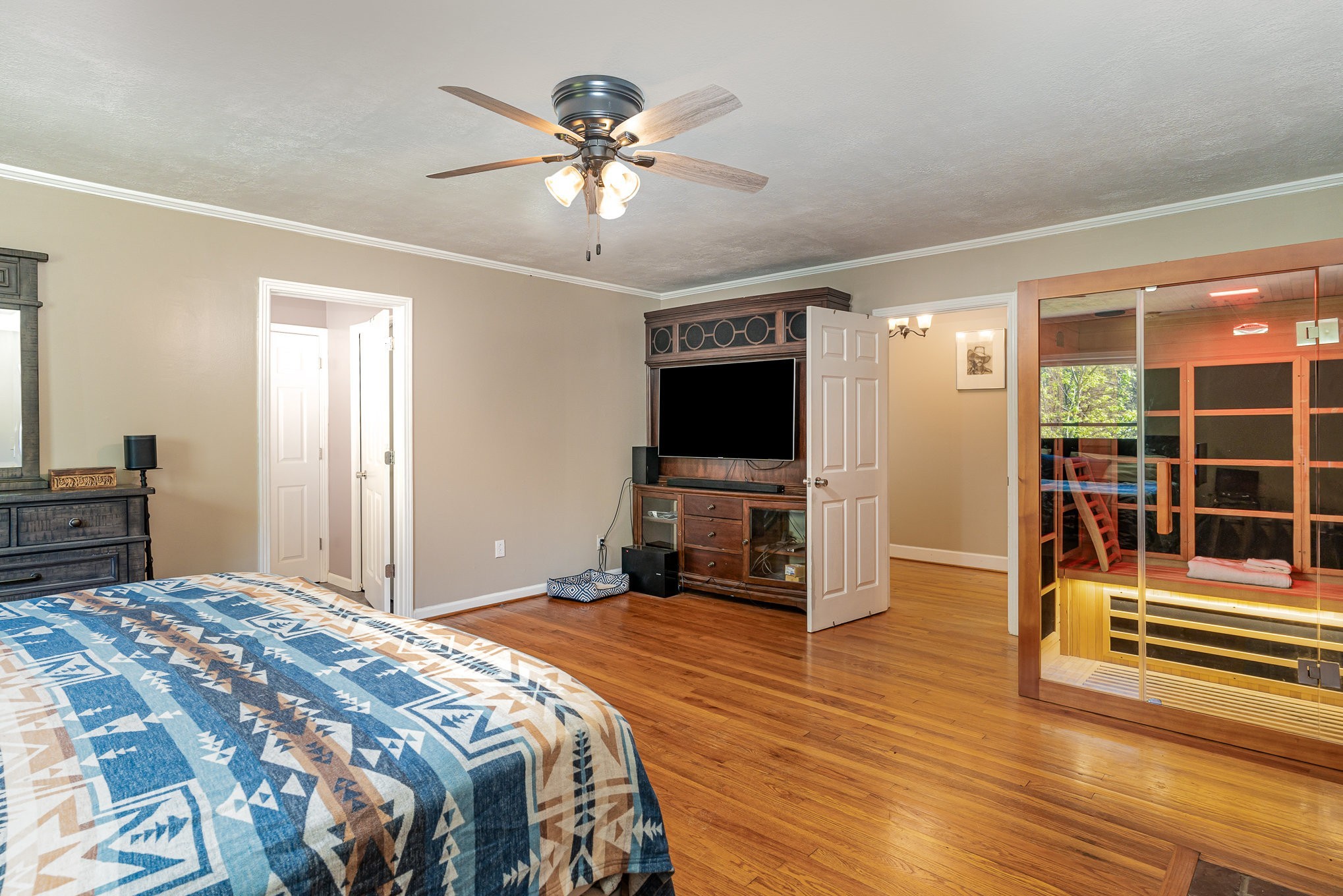 1029 Cumberland Heights Road Clarksville, TN 37040 - Photo 13 of 34 a bedroom with a bed and a flat screen tv