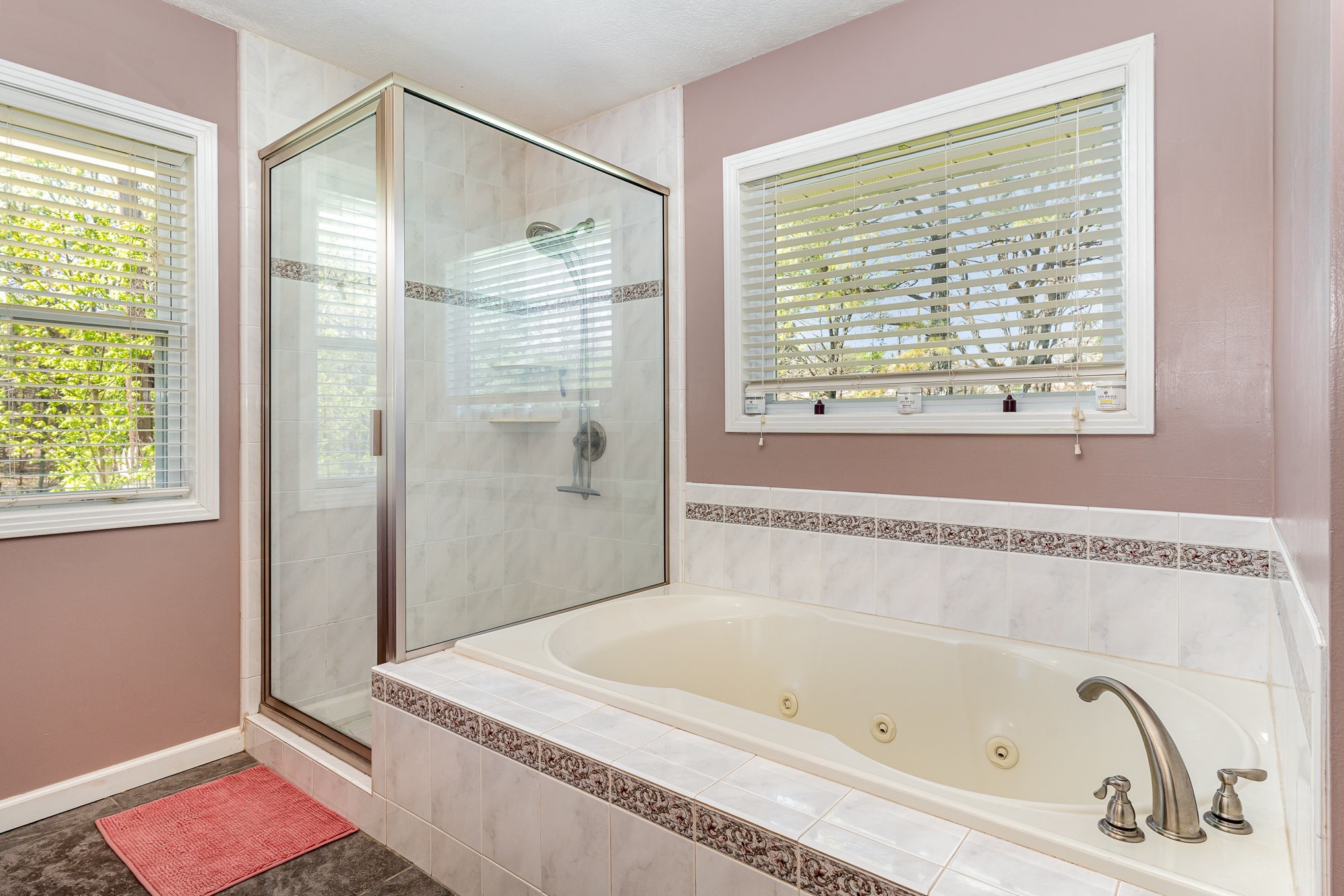 1029 Cumberland Heights Road Clarksville, TN 37040 - Photo 15 of 34 a bathroom with a tub and a shower