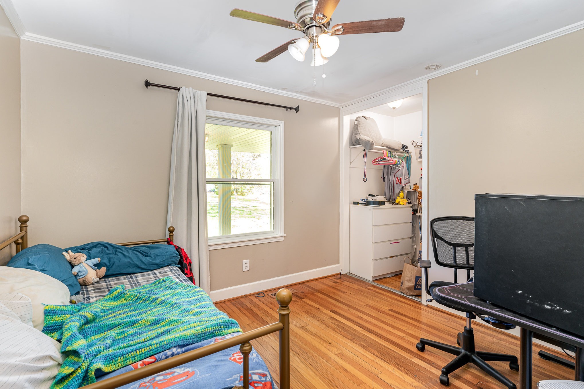 1029 Cumberland Heights Road Clarksville, TN 37040 - Photo 18 of 34 a bedroom with a bed and a window