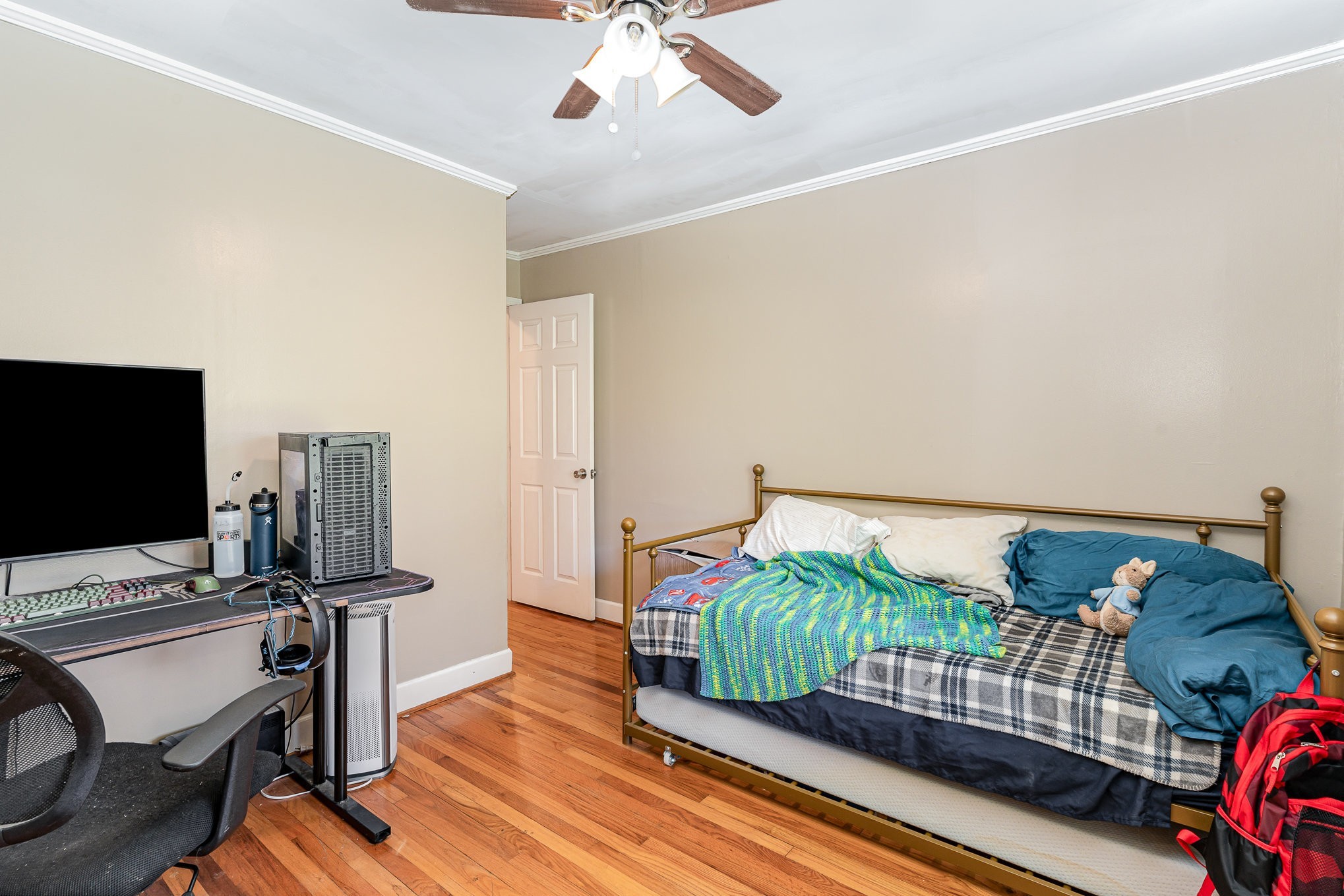 1029 Cumberland Heights Road Clarksville, TN 37040 - Photo 19 of 34 a bedroom with furniture and a wooden floor