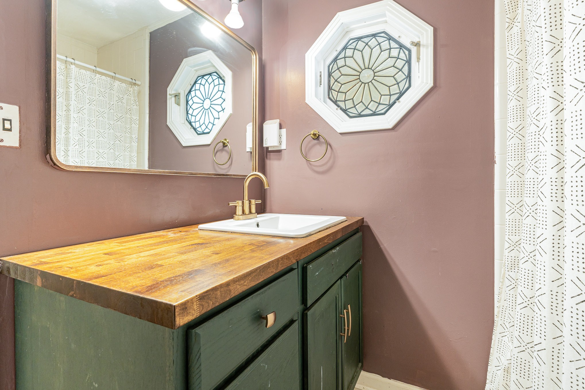 1029 Cumberland Heights Road Clarksville, TN 37040 - Photo 20 of 34 a bathroom with a sink and a mirror