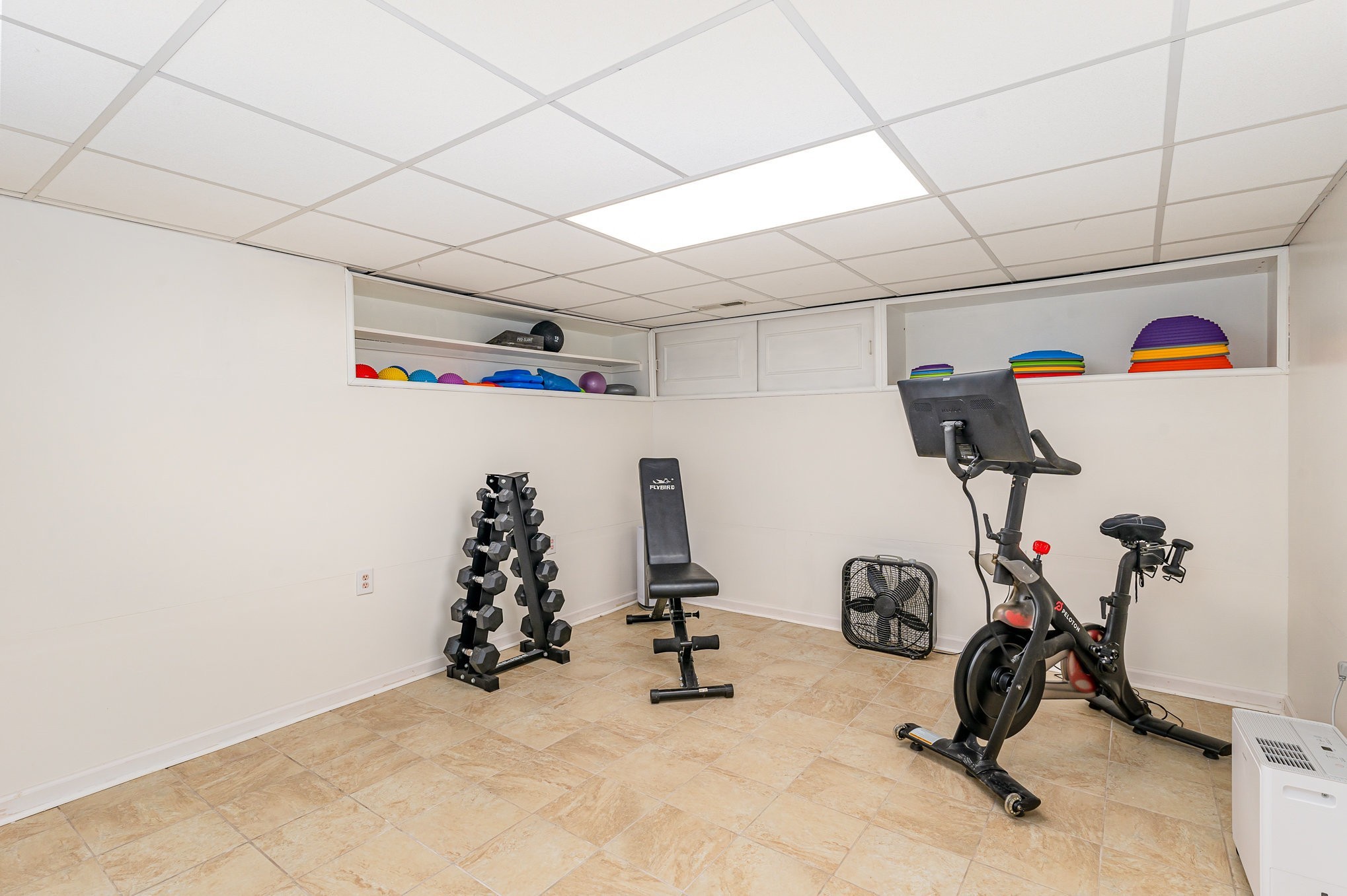 1029 Cumberland Heights Road Clarksville, TN 37040 - Photo 22 of 34 a view of a room with gym equipment