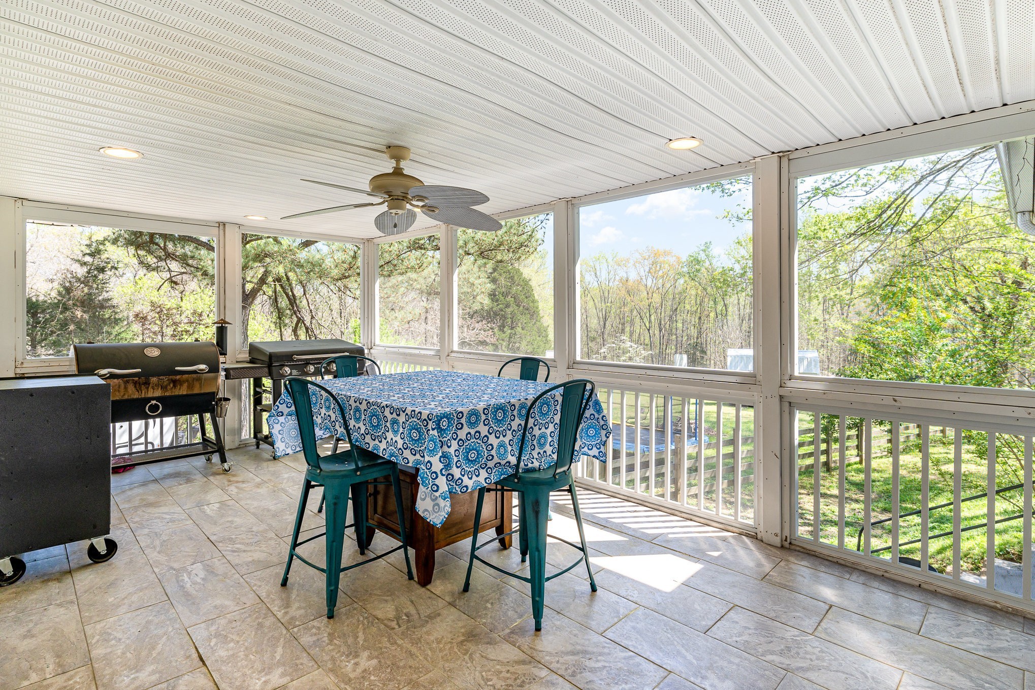 1029 Cumberland Heights Road Clarksville, TN 37040 - Photo 28 of 34 a dining room with furniture a rug and a chandelier