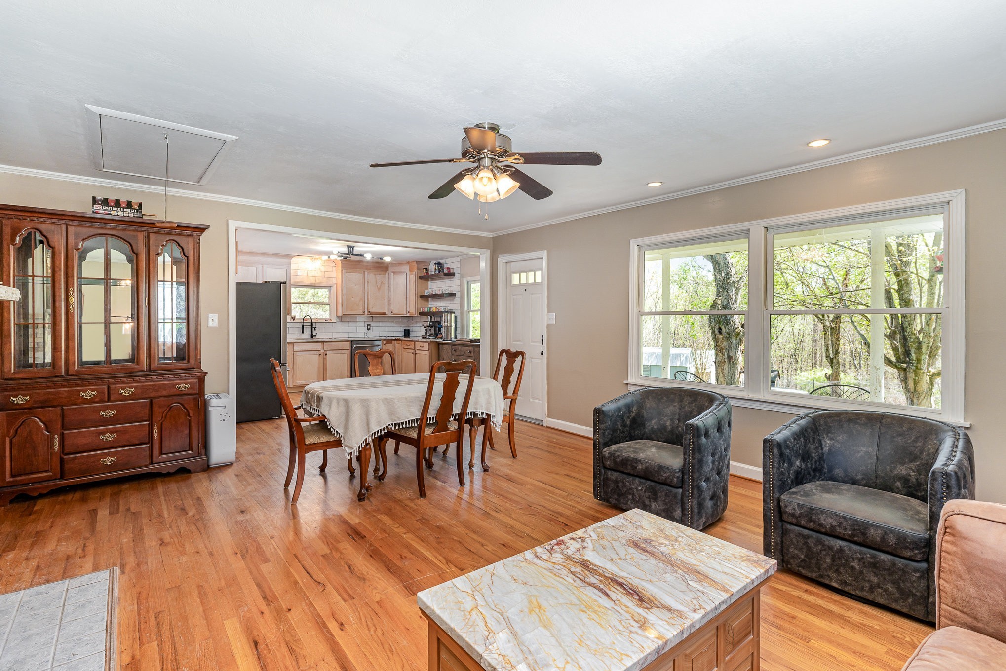 1029 Cumberland Heights Road Clarksville, TN 37040 - Photo 7 of 34 a view of a dining room with furniture window and wooden floor