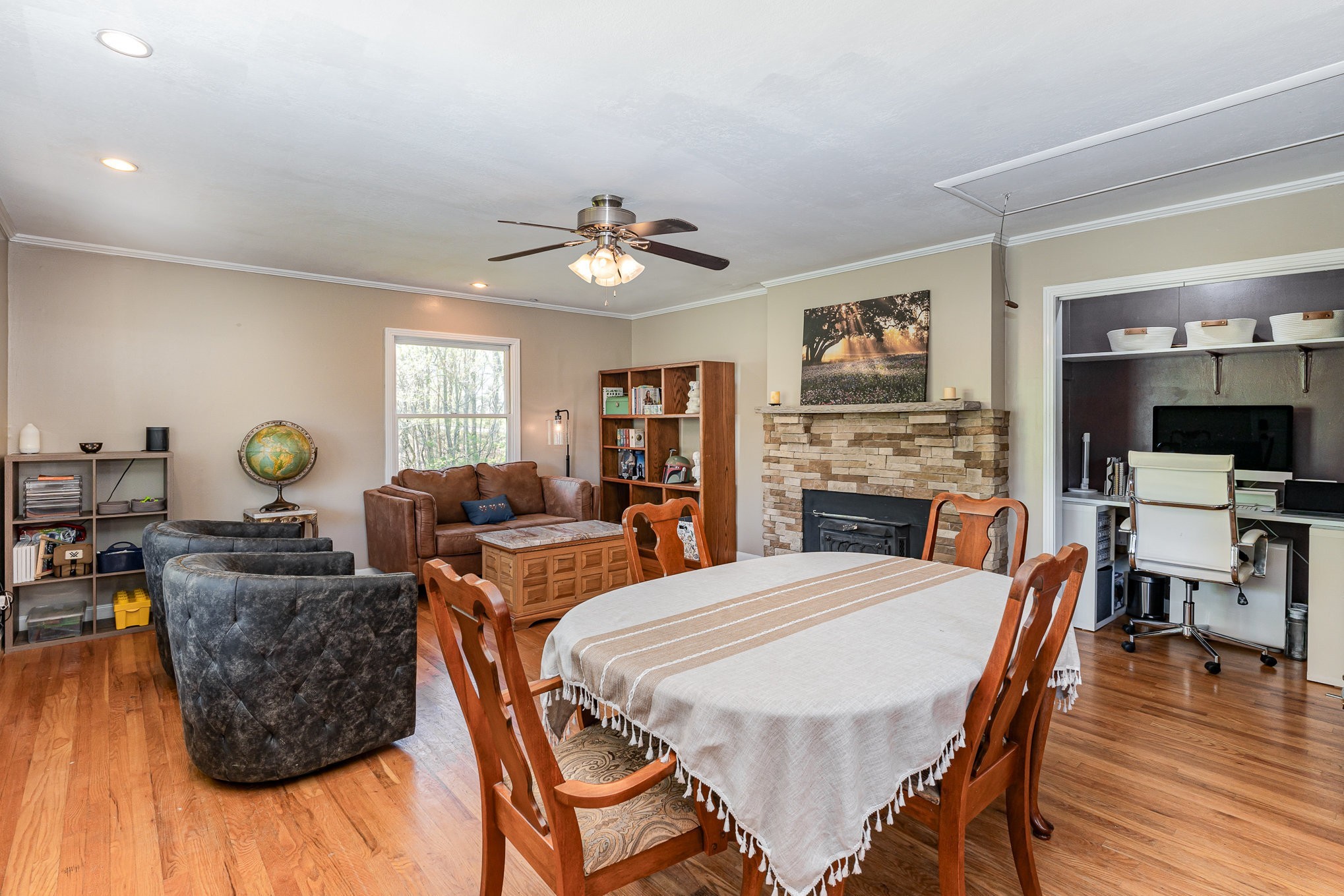 1029 Cumberland Heights Road Clarksville, TN 37040 - Photo 10 of 34 a view of a dining room with furniture window and wooden floor