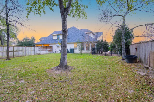 a view of a backyard with a garden