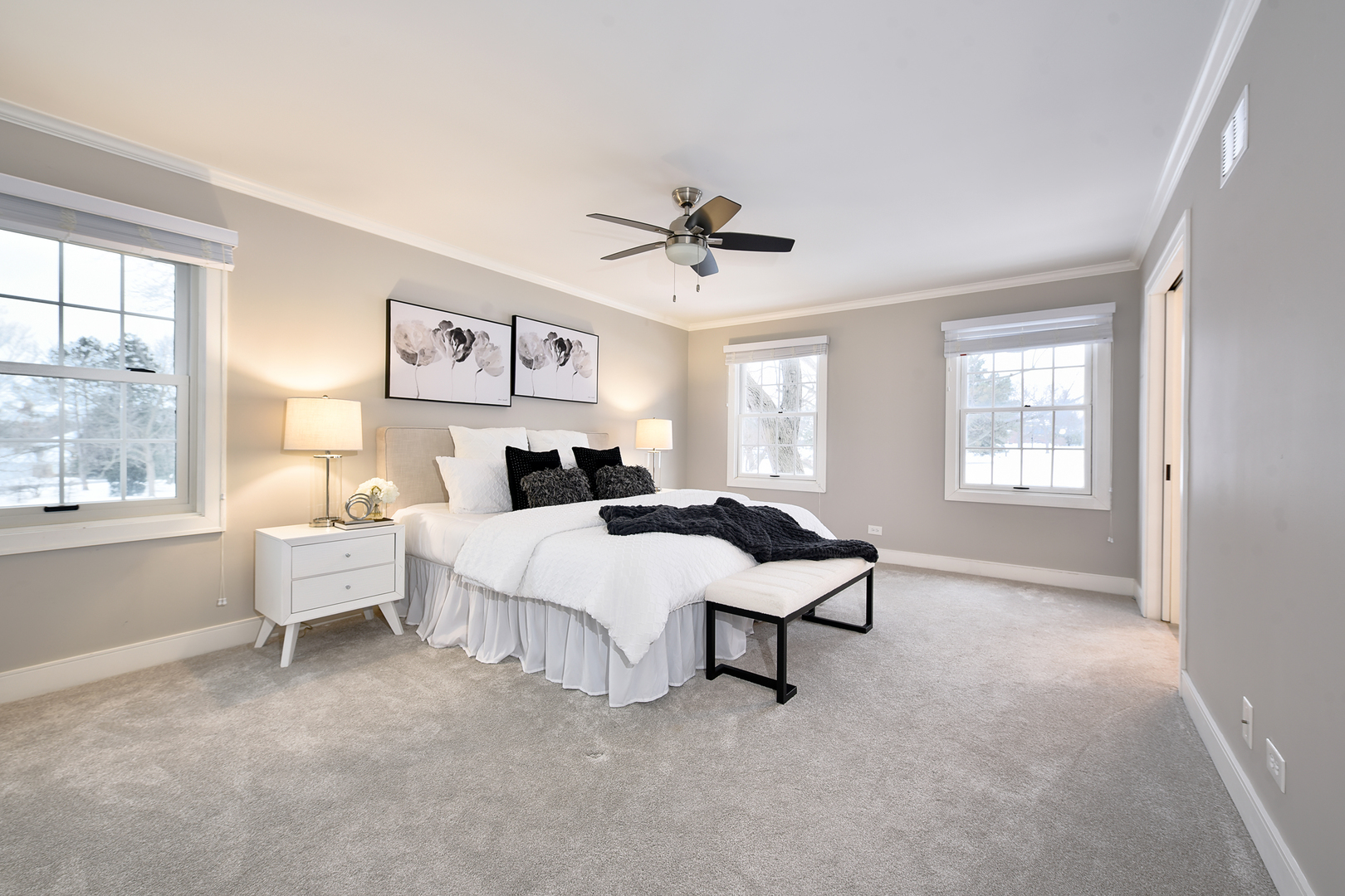 688 Thompson's Way Inverness, IL 60067 - Photo 20 of 34 a spacious bedroom with a bed and window