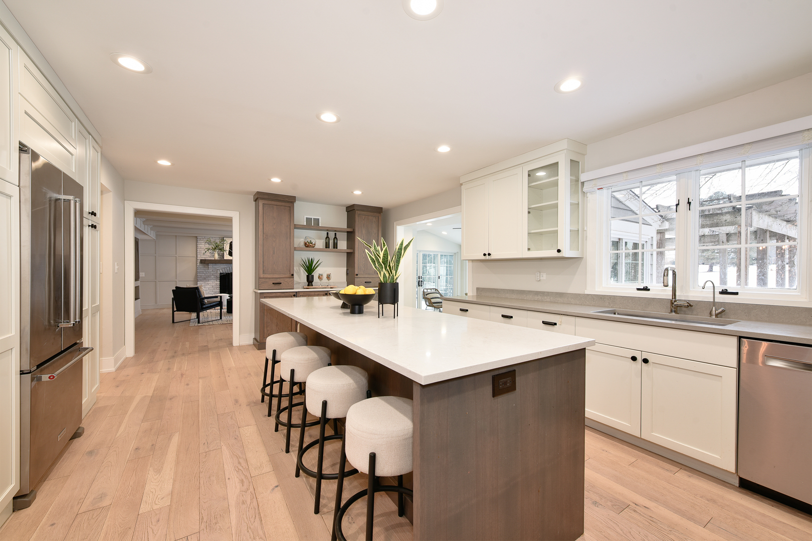 688 Thompson's Way Inverness, IL 60067 - Photo 2 of 34 a large kitchen with a table and chairs in it