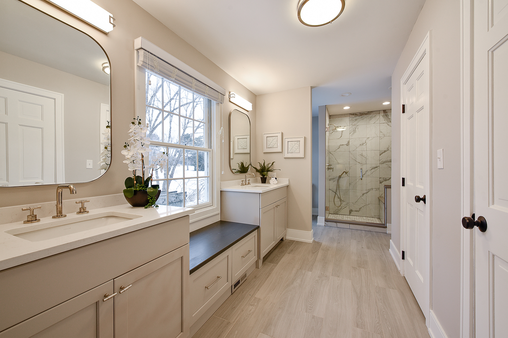 688 Thompson's Way Inverness, IL 60067 - Photo 21 of 34 a spacious bathroom with a double vanity sink a mirror a window and a shower