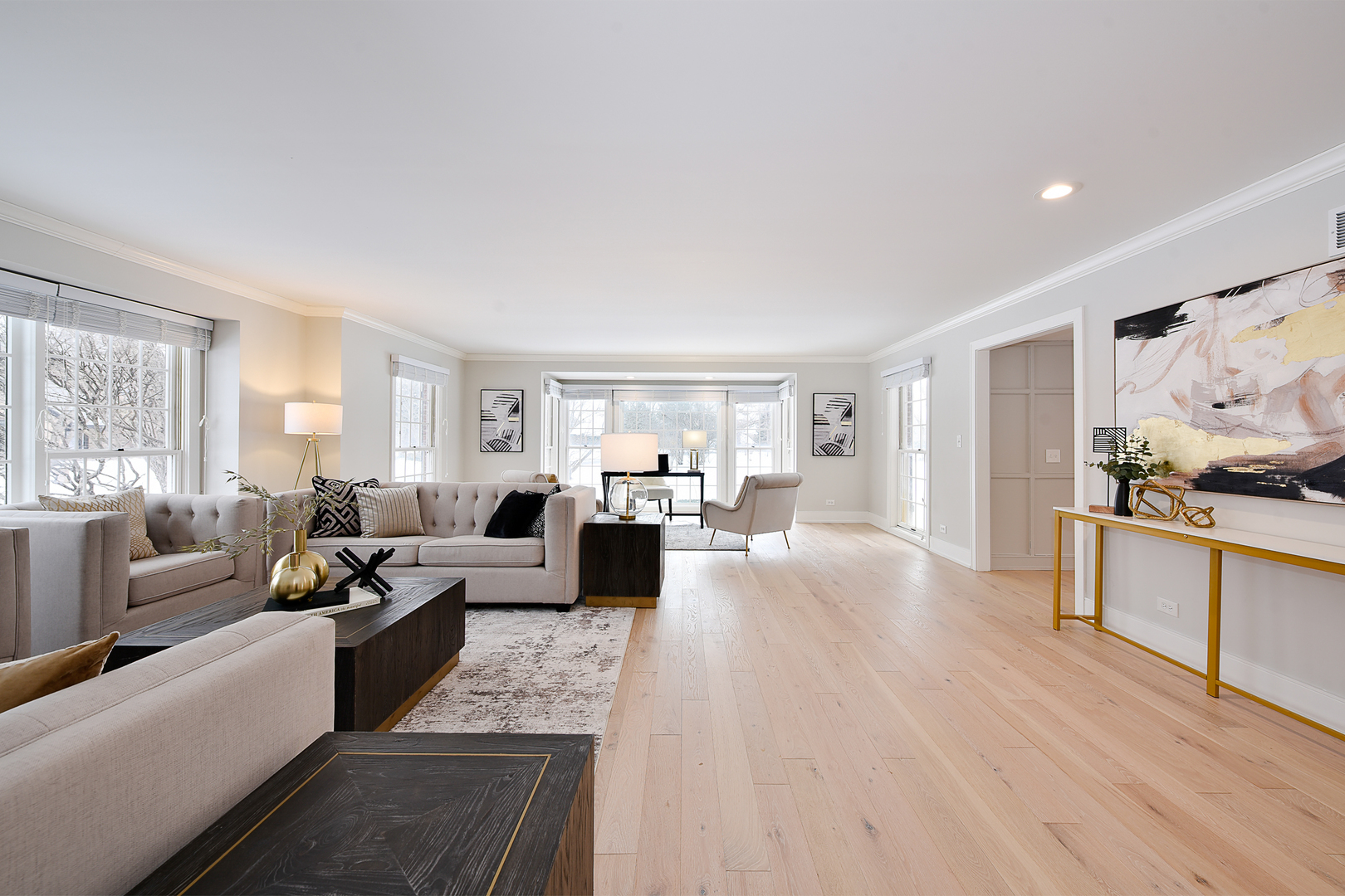 688 Thompson's Way Inverness, IL 60067 - Photo 9 of 34 a living room with furniture and a kitchen