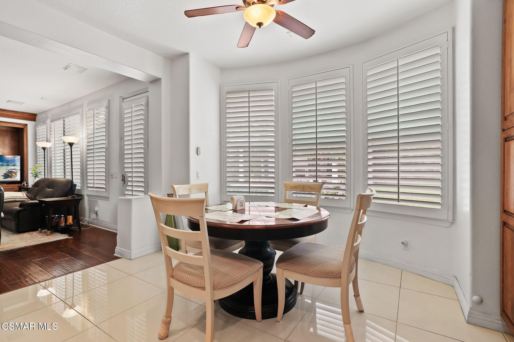 20253 Vía Galileo Porter Ranch, CA 91326 - Photo 11 of 41 a view of a dining room with furniture and chandelier