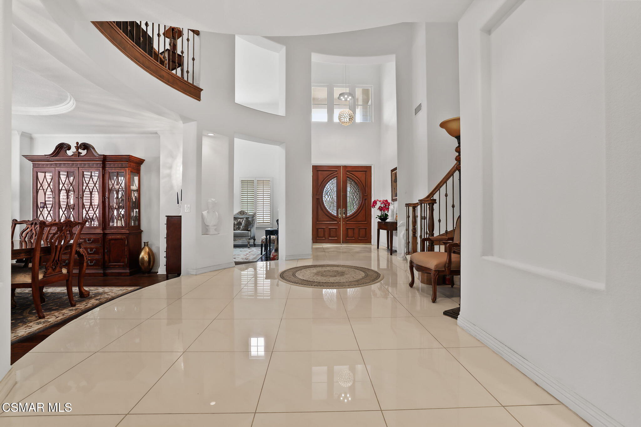 20253 Vía Galileo Porter Ranch, CA 91326 - Photo 12 of 41 a view of a livingroom with furniture and staircase
