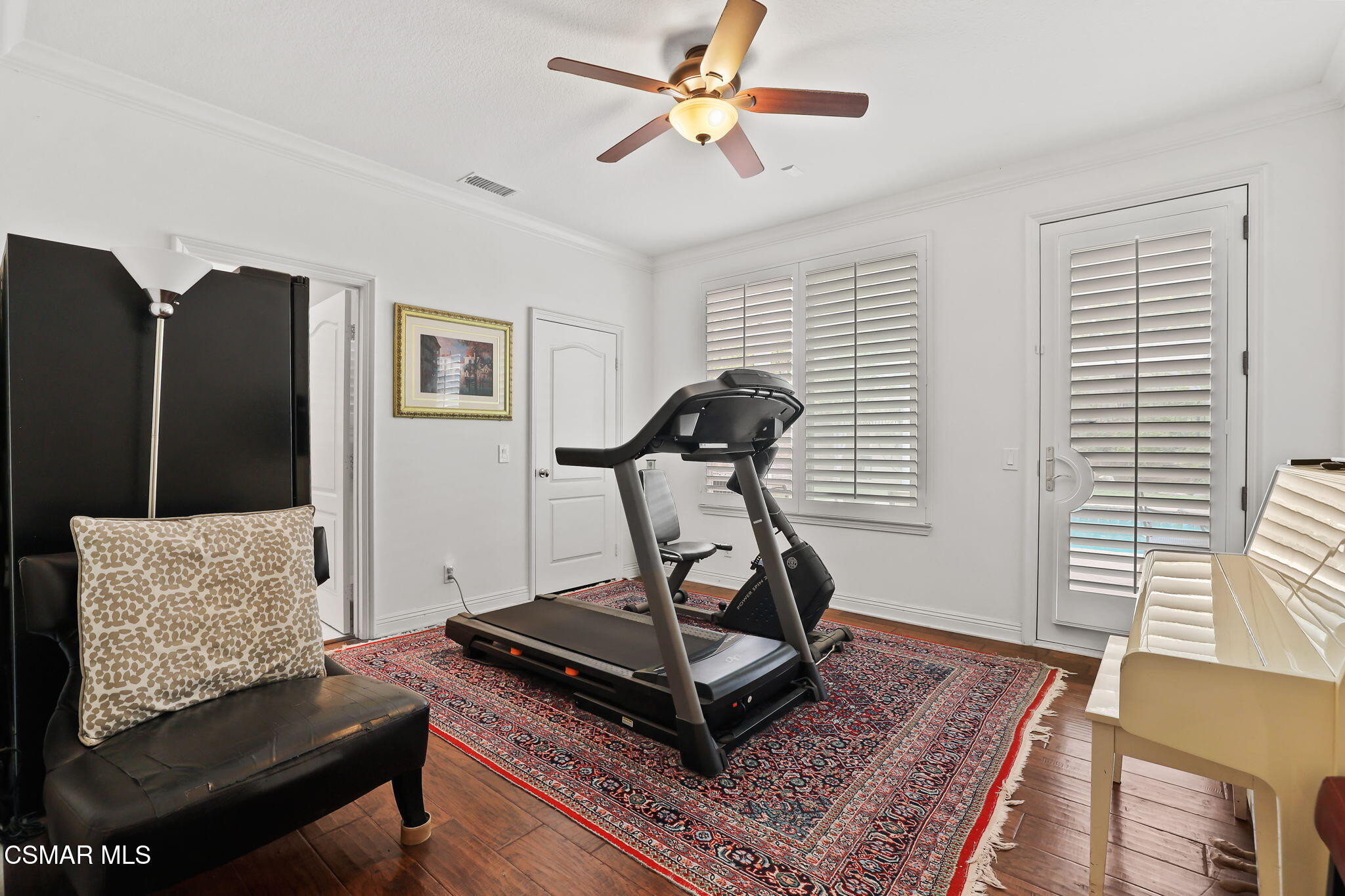 20253 Vía Galileo Porter Ranch, CA 91326 - Photo 18 of 41 a view of workspace with furniture gym equipment and windows