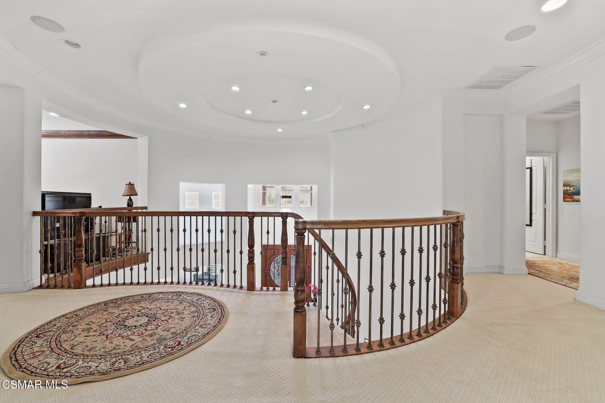 20253 Vía Galileo Porter Ranch, CA 91326 - Photo 21 of 41 a view of a hallway with a couch