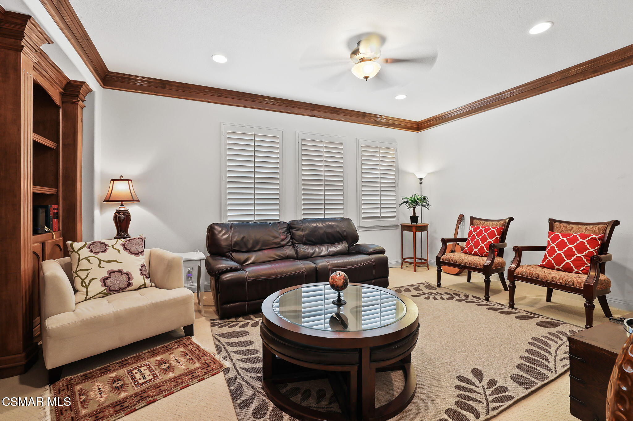 20253 Vía Galileo Porter Ranch, CA 91326 - Photo 22 of 41 a living room with furniture a rug and a chandelier
