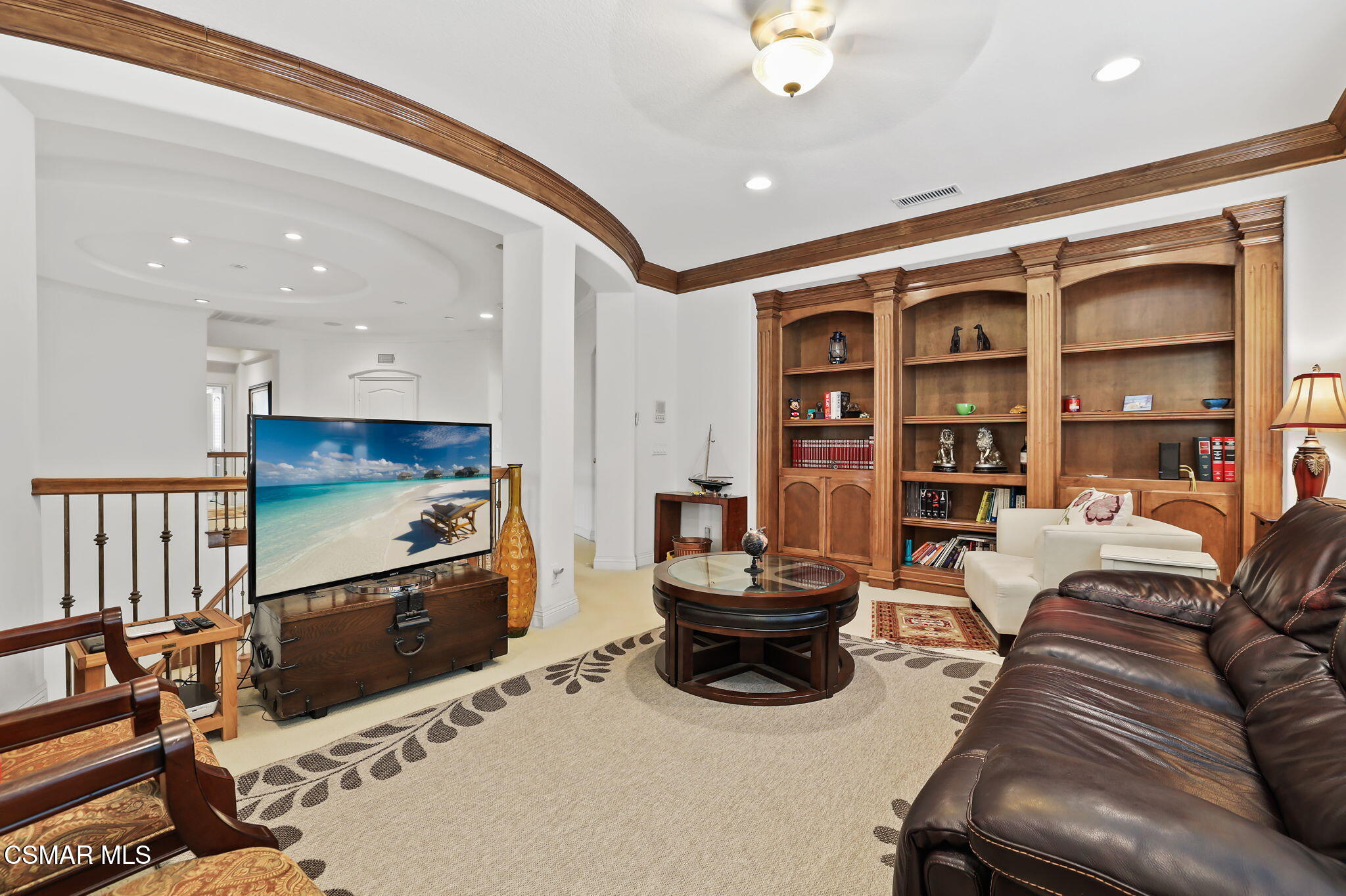 20253 Vía Galileo Porter Ranch, CA 91326 - Photo 23 of 41 a living room with furniture and a flat screen tv