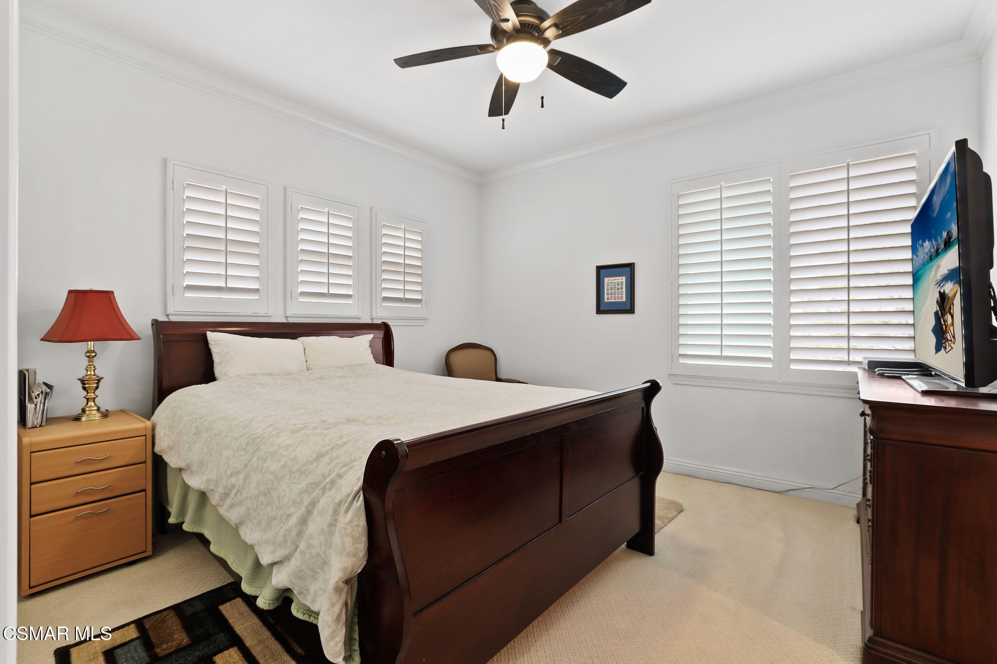 20253 Vía Galileo Porter Ranch, CA 91326 - Photo 24 of 41 a bedroom with a bed and a window