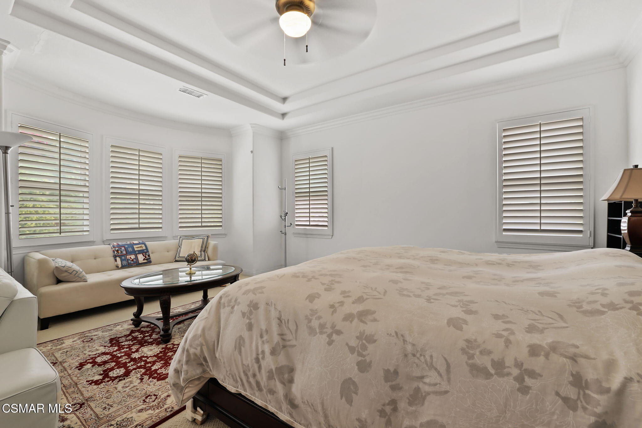 20253 Vía Galileo Porter Ranch, CA 91326 - Photo 29 of 41 a bedroom with a bed and a chandelier