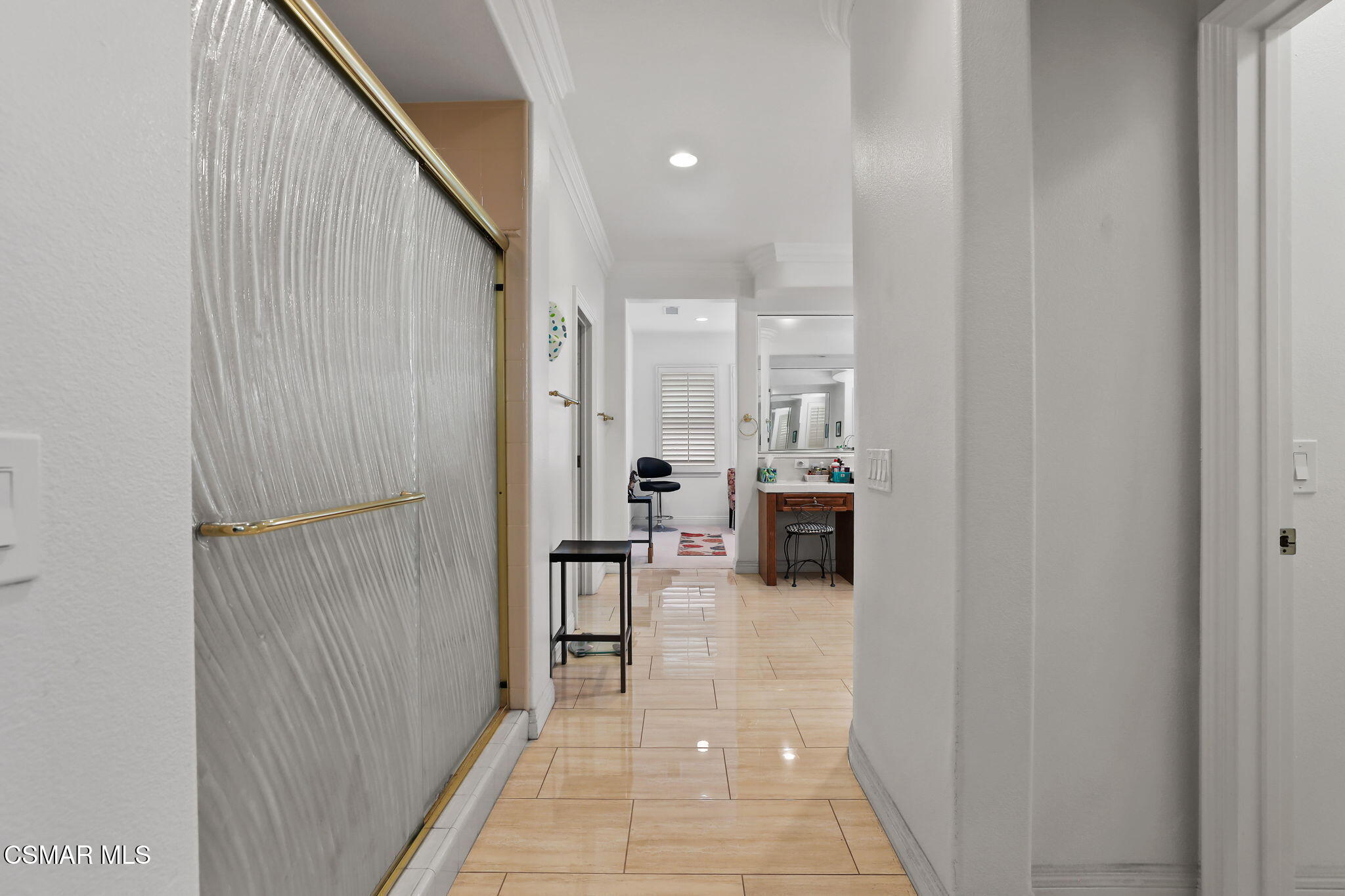 20253 Vía Galileo Porter Ranch, CA 91326 - Photo 30 of 41 a view of a hallway with a dining room with furniture