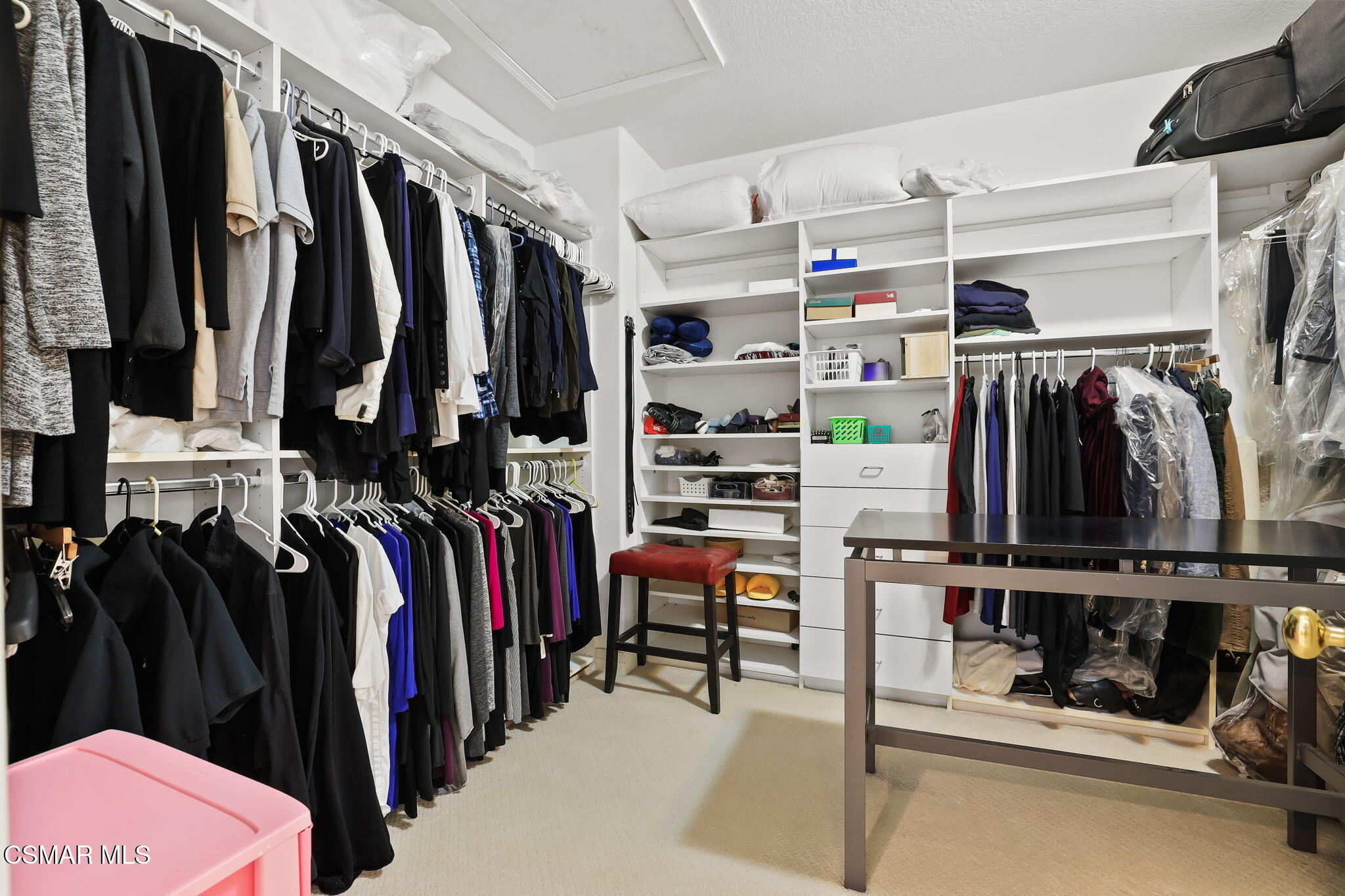 20253 Vía Galileo Porter Ranch, CA 91326 - Photo 35 of 41 a view of walk in closet with clothes and shoes