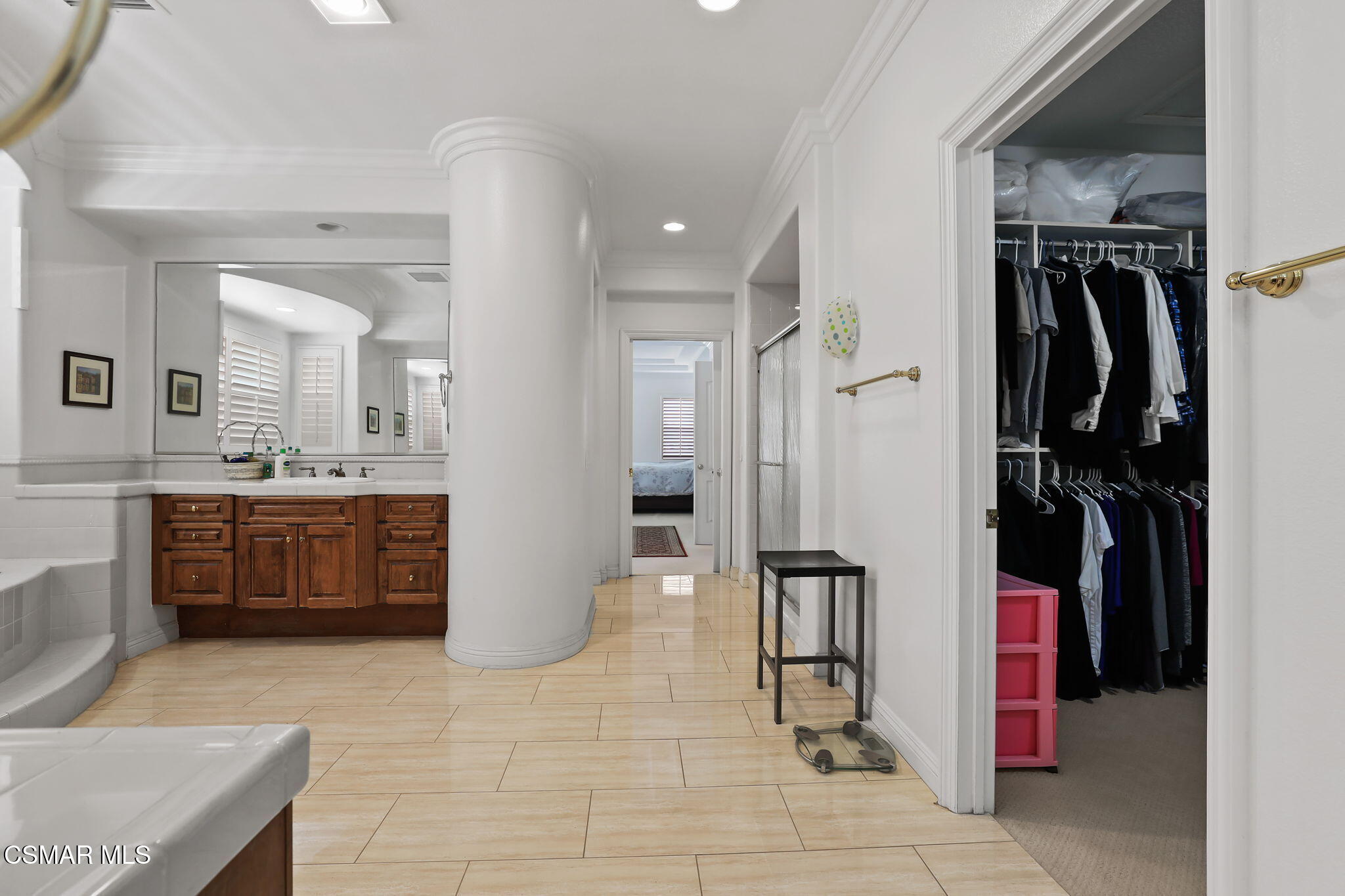 20253 Vía Galileo Porter Ranch, CA 91326 - Photo 36 of 41 a bathroom with a double vanity sink a toilet and a tub