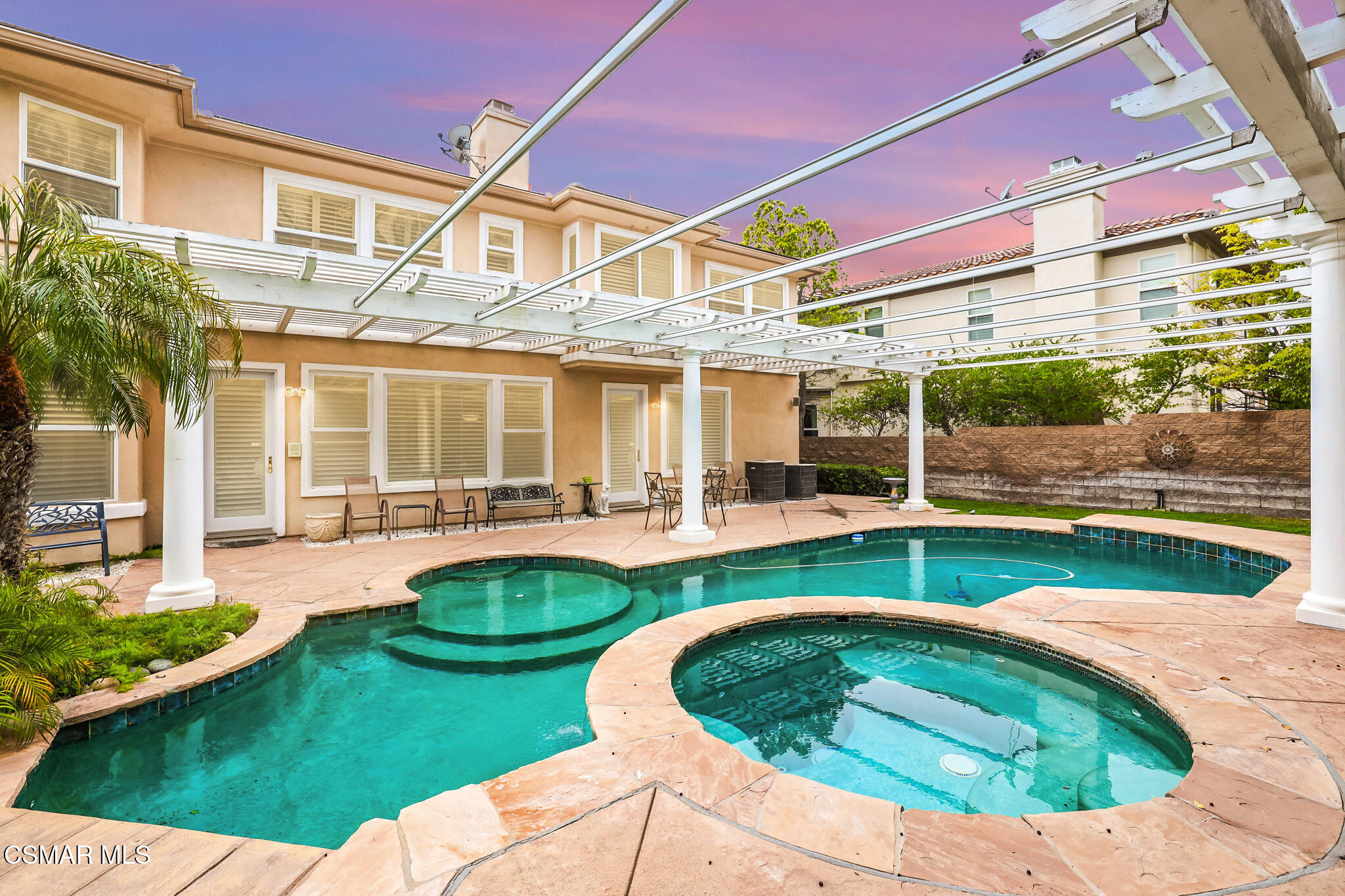 20253 Vía Galileo Porter Ranch, CA 91326 - Photo 40 of 41 a view of a house with backyard sitting area and swimming pool