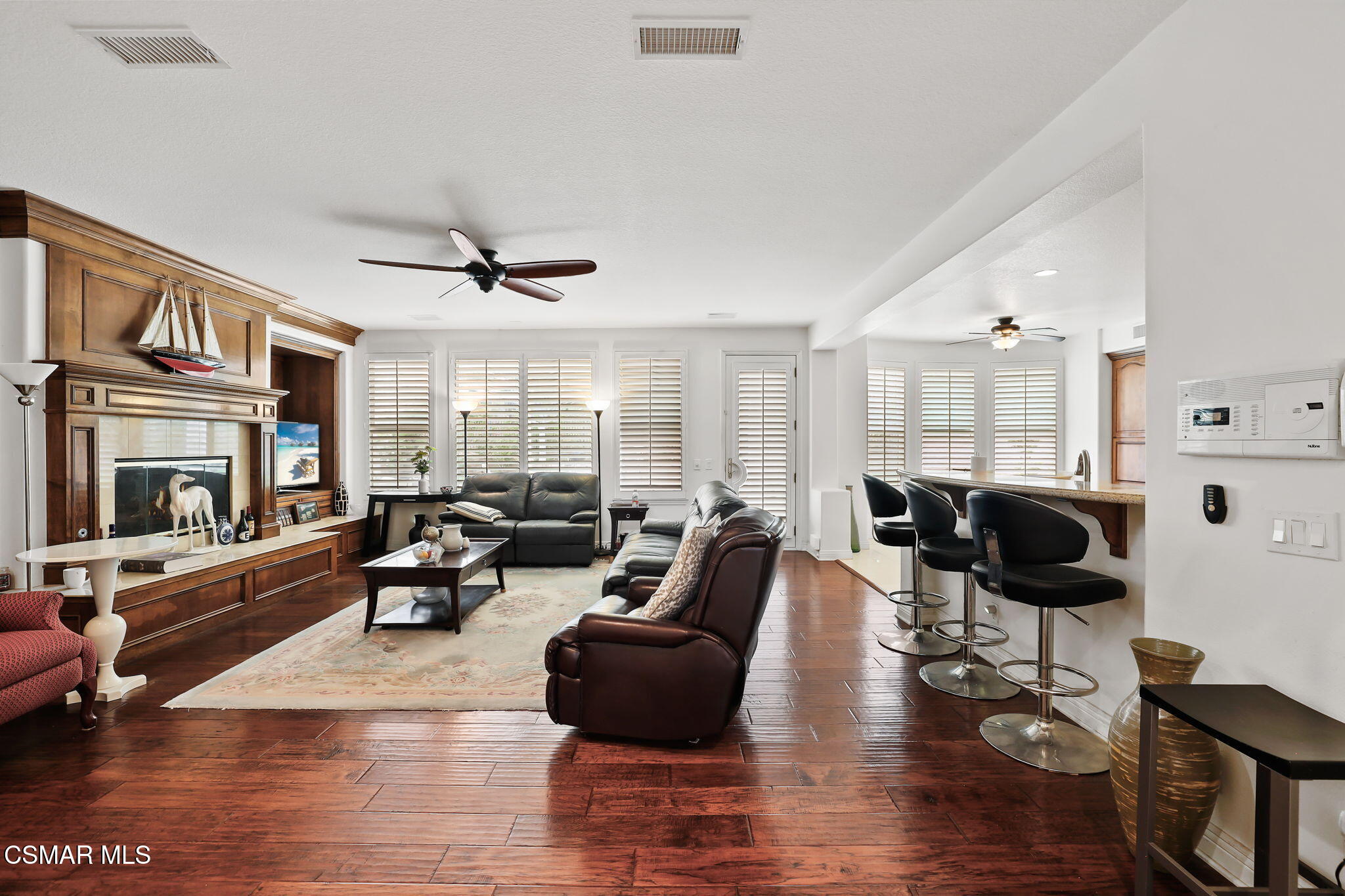 20253 Vía Galileo Porter Ranch, CA 91326 - Photo 5 of 41 a living room with furniture window and wooden floor