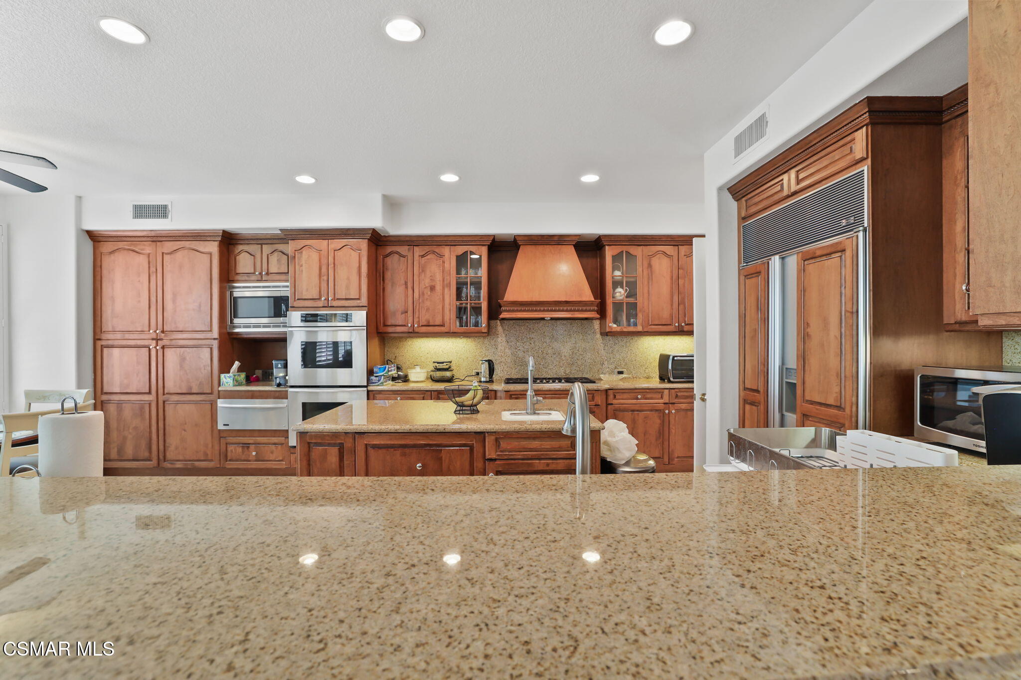 20253 Vía Galileo Porter Ranch, CA 91326 - Photo 8 of 41 a view of kitchen with stainless steel appliances cabinets