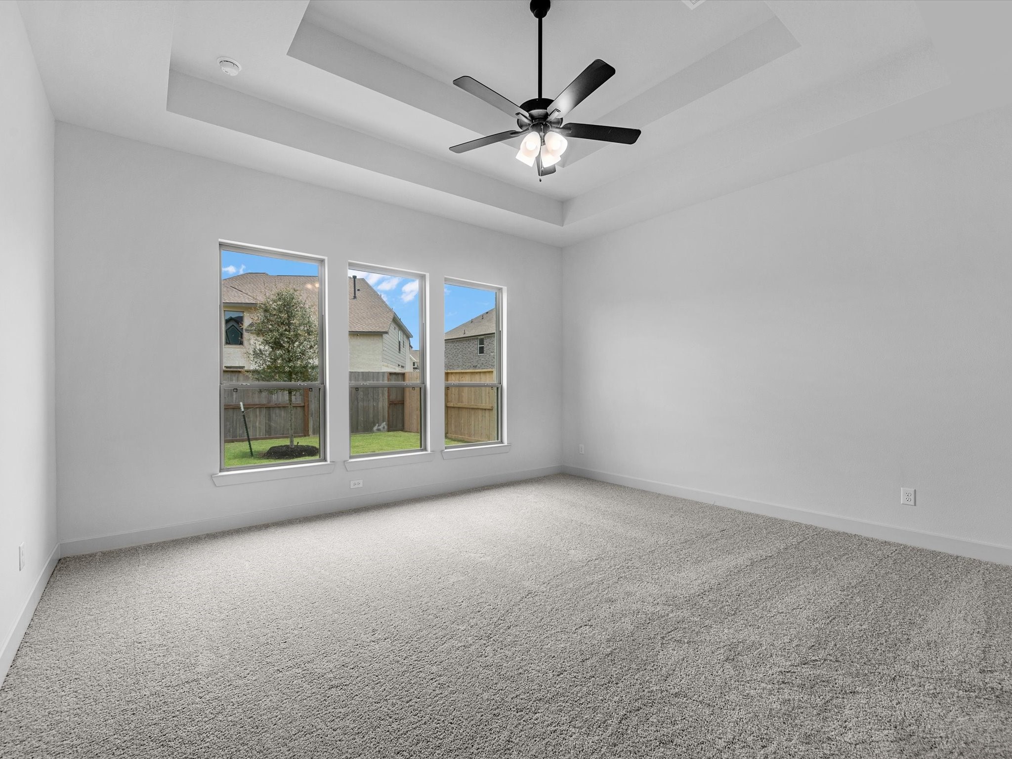8915 Acropolis Lane Manvel, TX 77578 - Photo 13 of 32 a view of an empty room with a window