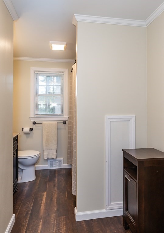 2 East Colonial Road Wilbraham, MA 01095 - Photo 22 of 42 a bathroom with a toilet a sink and a window