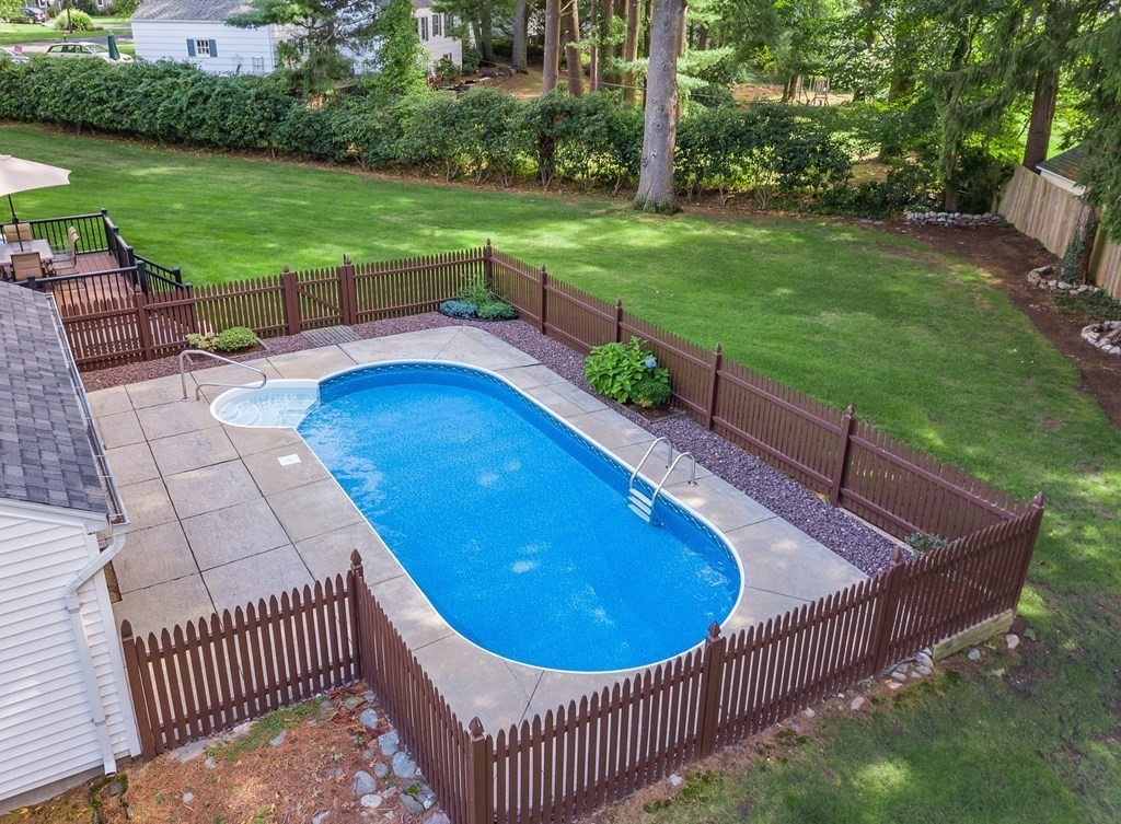 2 East Colonial Road Wilbraham, MA 01095 - Photo 30 of 42 a view of a backyard with a garden and sitting area