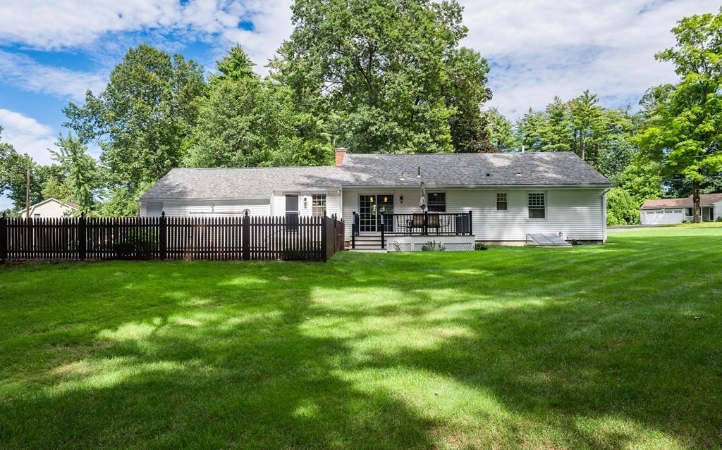 2 East Colonial Road Wilbraham, MA 01095 - Photo 36 of 42 a view of a house with a backyard and a patio
